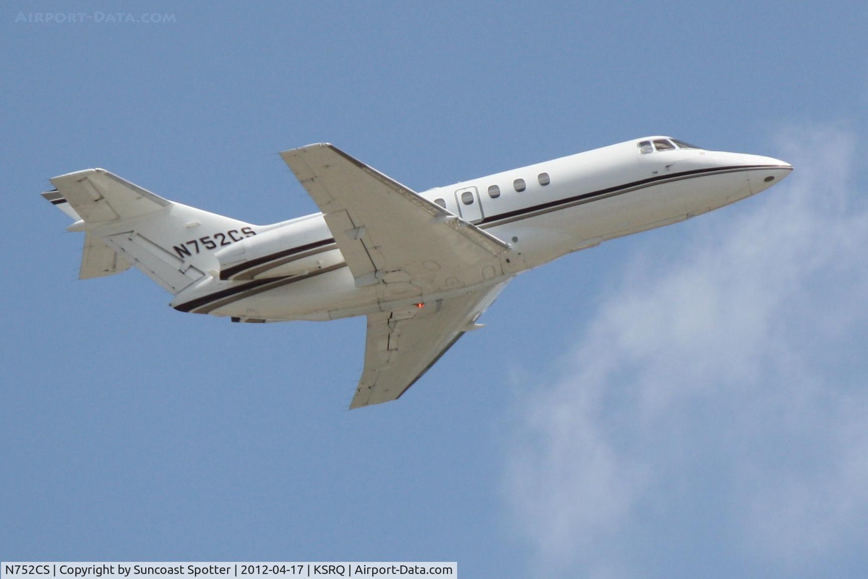 N752CS, 1996 Raytheon Hawker 800 C/N 258323, N752CS departs Runway 14 at Sarasota-Bradenton International Airport