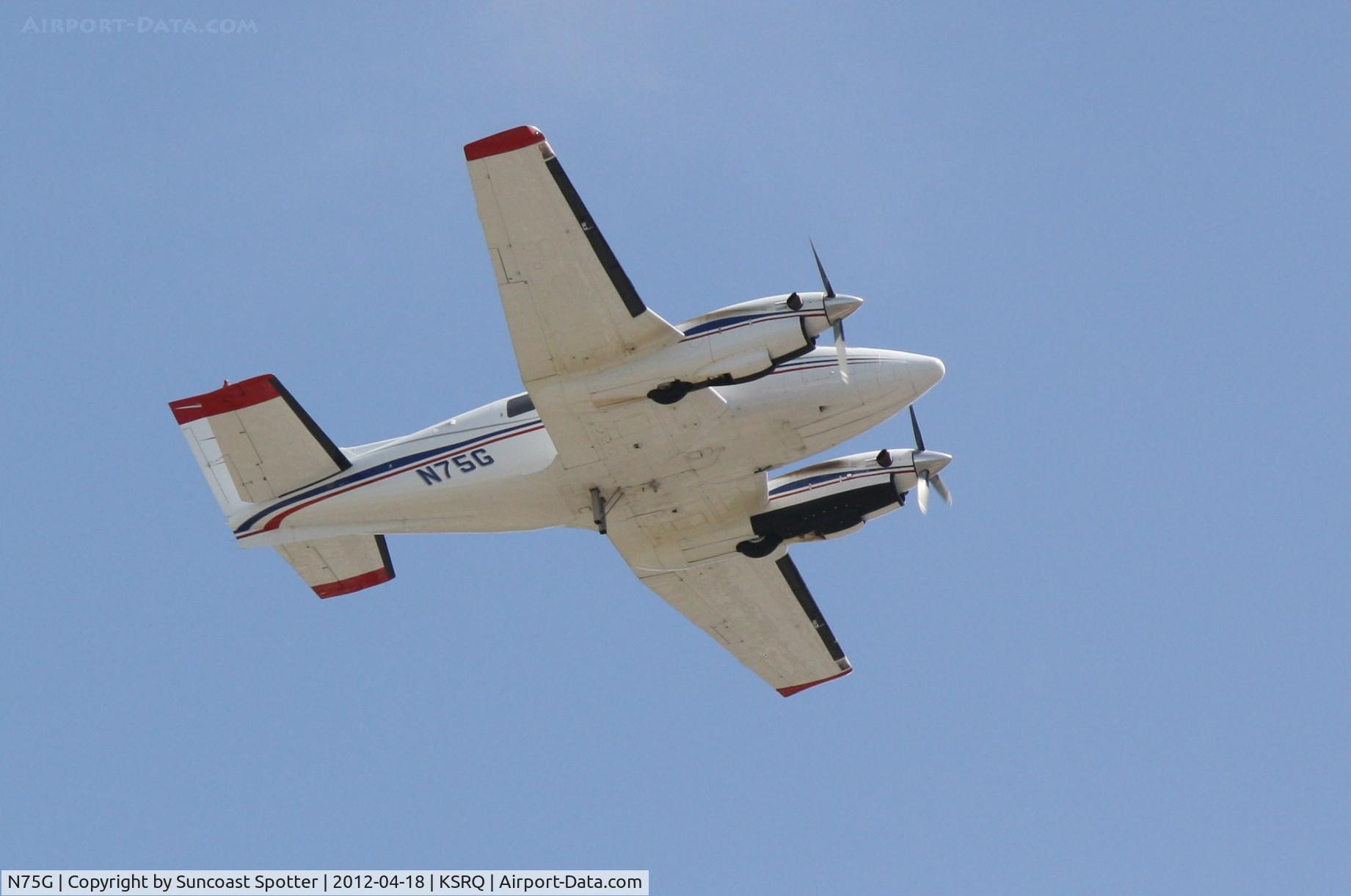 N75G, 1967 Beech U-21A Ute C/N LM-83, N75G departs Runway 14 at Sarasota-Bradenton International Airport
