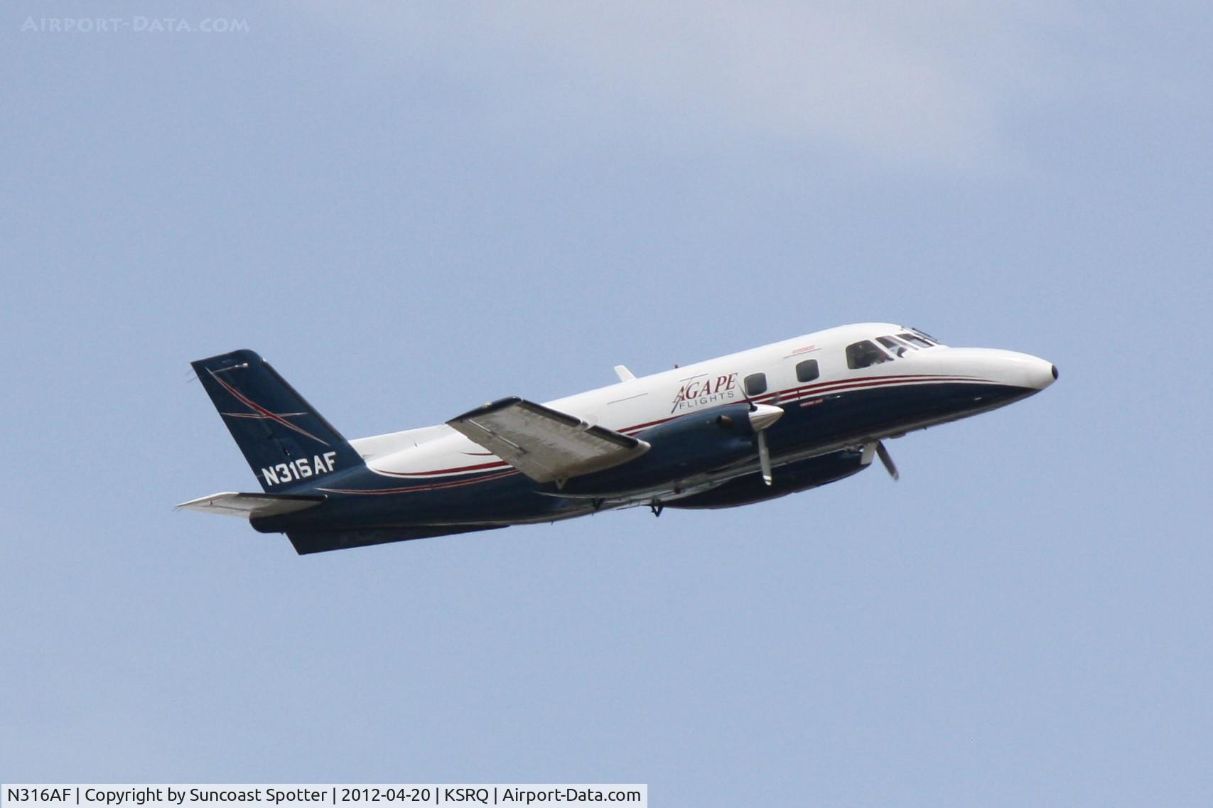 N316AF, 1980 Embraer EMB-110P1 Bandeirante C/N 110.271, Agape Flights N316AF departs Runway 14 at Sarasota-Bradenton International Airport
