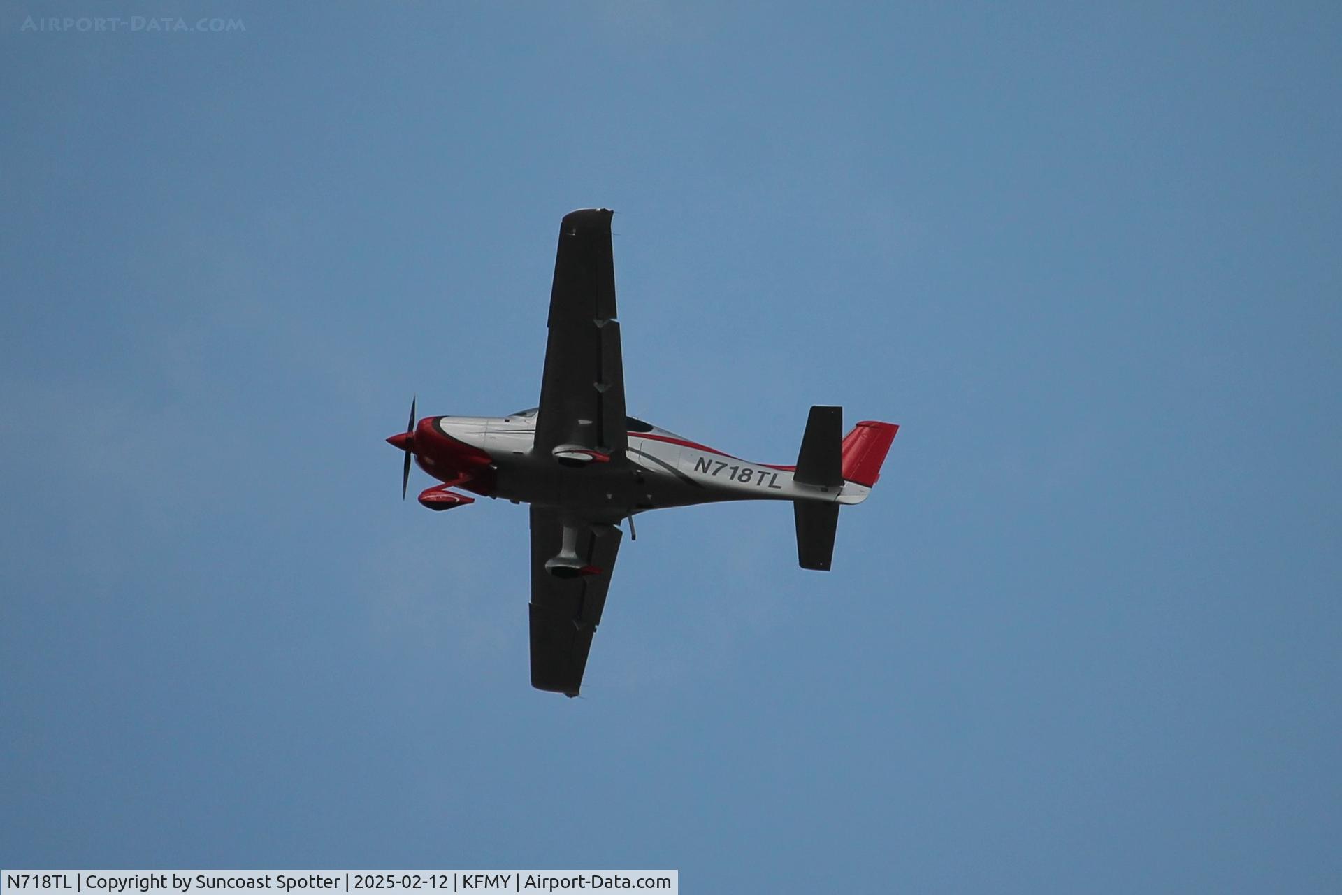 N718TL, 2014 Cirrus SR22 C/N 4103, Cirrus 718TL performs a low approach to Runway 23 at Page Field following flight from Naples Municipal Airport