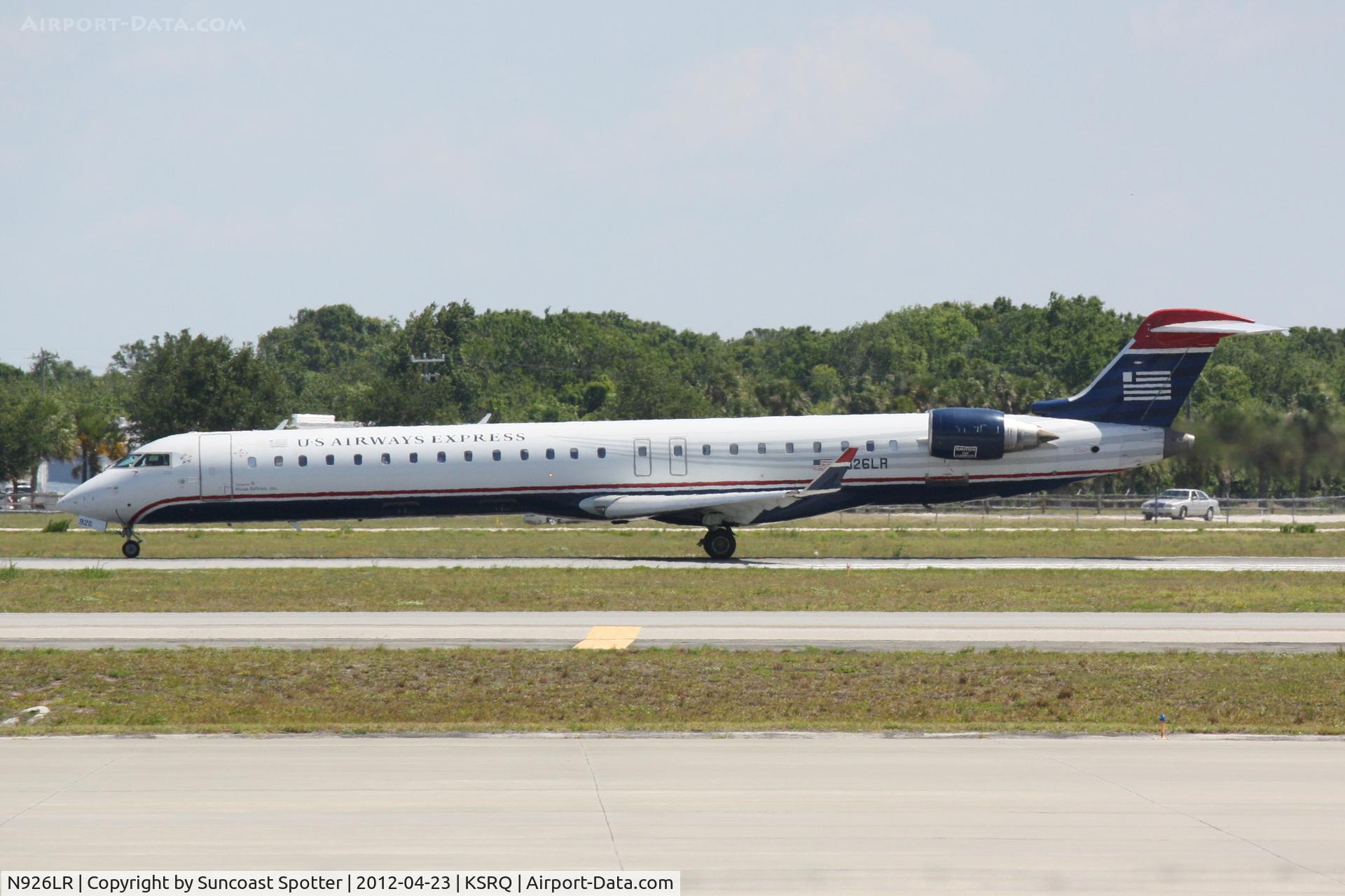 N926LR, 2004 Bombardier CRJ-900ER (CL-600-2D24) C/N 15026, Mesa/US Air Flight 2662 departs Runway 32 at Sarasota-Bradenton International Airport enroute to Charlotte-Douglas International Airport
