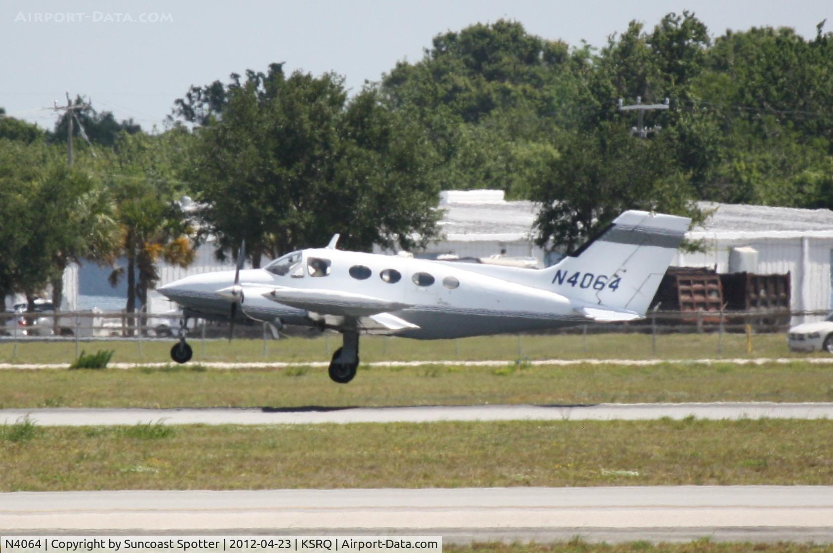 N4064, 1968 Cessna 421 Golden Eagle C/N 421-0064, N4064 departs Runway 32 at Sarasota-Bradenton International Airport