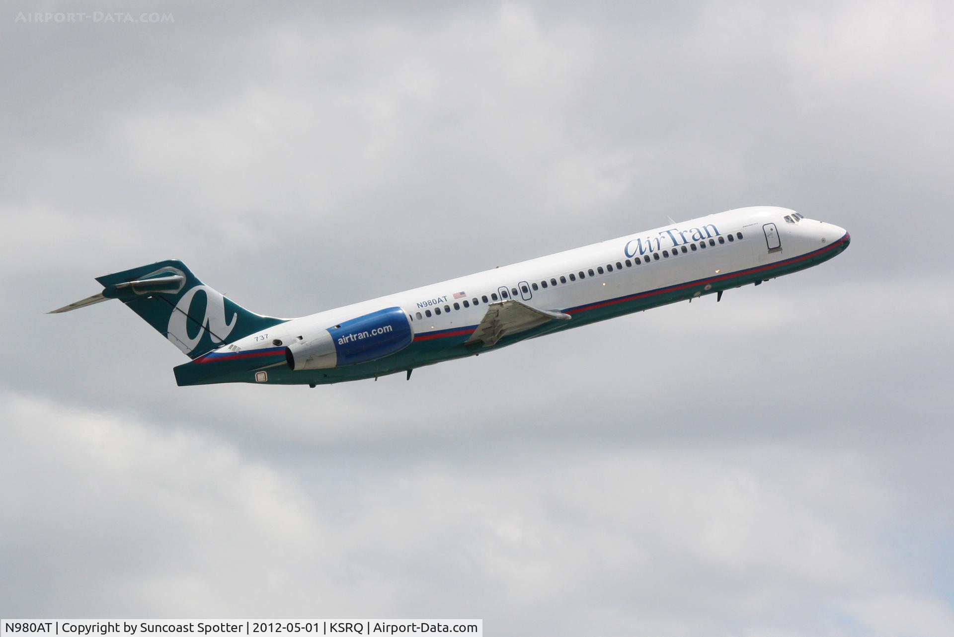 N980AT, 2002 Boeing 717-200 C/N 55039, AirTran Flight 988 departs Runway 14 at Sarasota-Bradenton International Airport enroute to Chicago-Midway International Airport