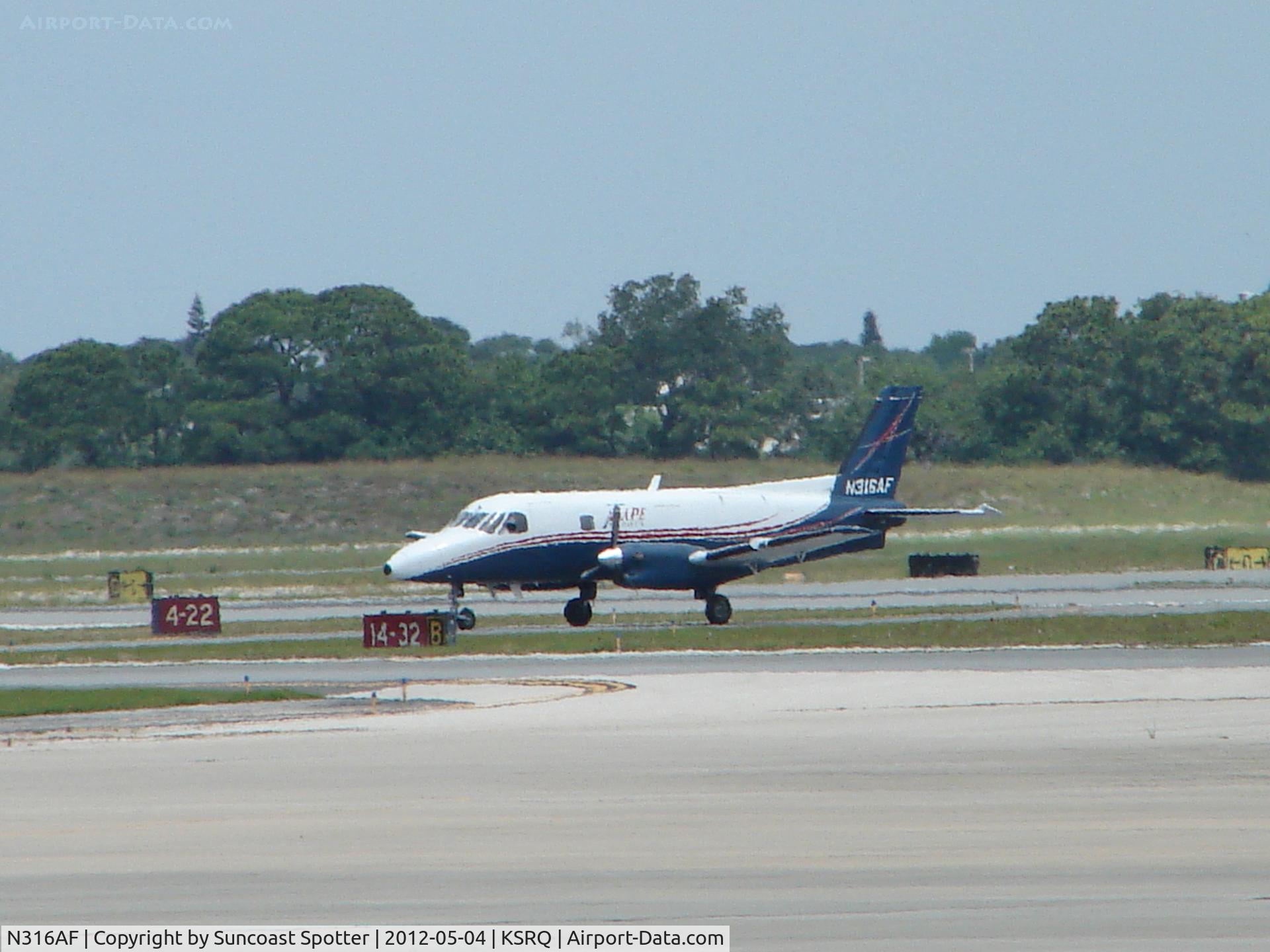 N316AF, 1980 Embraer EMB-110P1 Bandeirante C/N 110.271, Agape Flights lands at SRQ