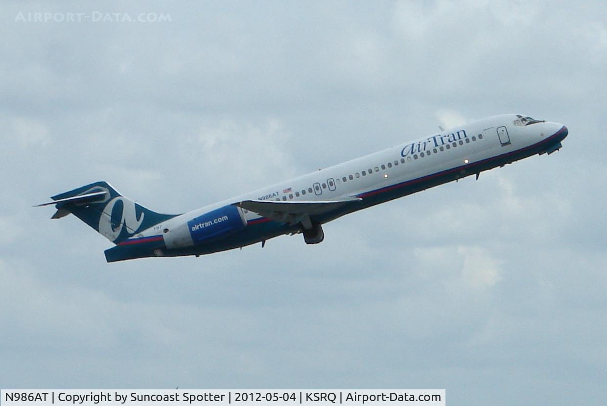 N986AT, 2001 Boeing 717-200 C/N 55089, AirTran Flight 988 departs Runway 14 at Sarasota-Bradenton International Airport enroute to Chicago-Midway International Airport