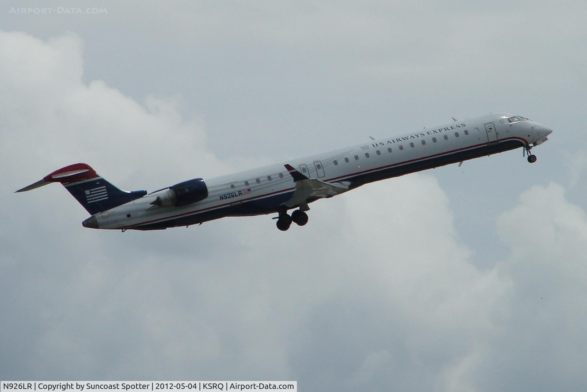 N926LR, 2004 Bombardier CRJ-900ER (CL-600-2D24) C/N 15026, Mesa/US Air Flight 2662 departs Runway 14 at Sarasota-Bradenton International Airport enroute to Charlotte/Douglas International Airport