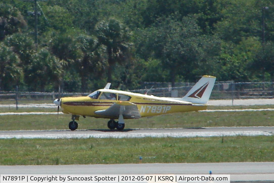 N7891P, 1962 Piper PA-24-250 Comanche C/N 24-3120, Piper Comanche departs Runway 32 at Sarasota-Bradenton International Airport
