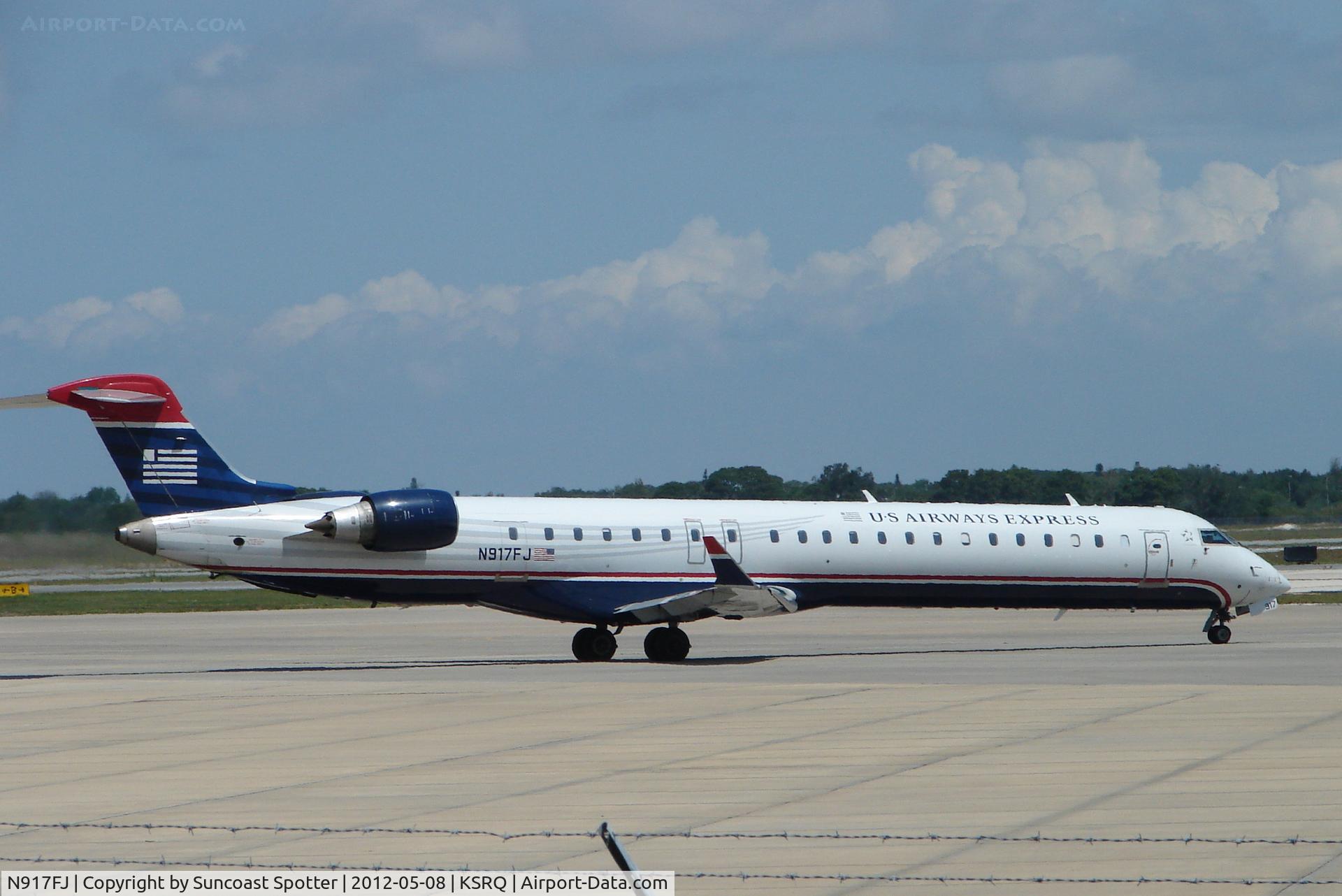 N917FJ, 2004 Bombardier CRJ-900ER (CL-600-2D24) C/N 15017, US Air/Mesa Flight 2662 prepares from flight at Sarasota-Bradenton International Airport