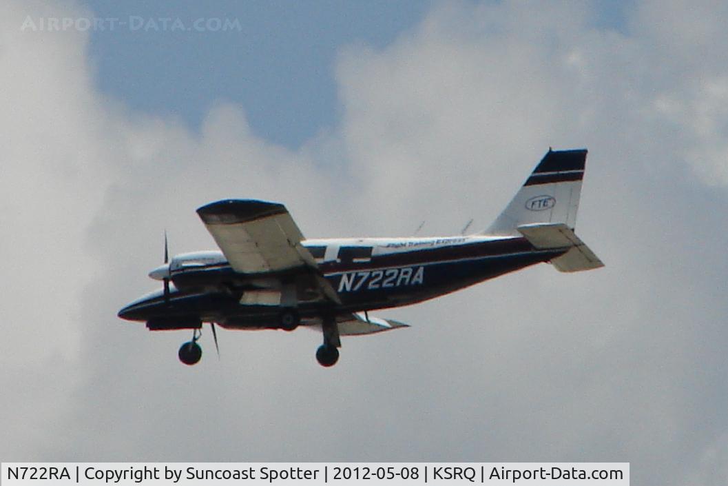 N722RA, 1972 Piper PA-34-200 C/N 34-7250352, Piper Seneca - N722RA flies over Sarasota-Bradenton International Airport