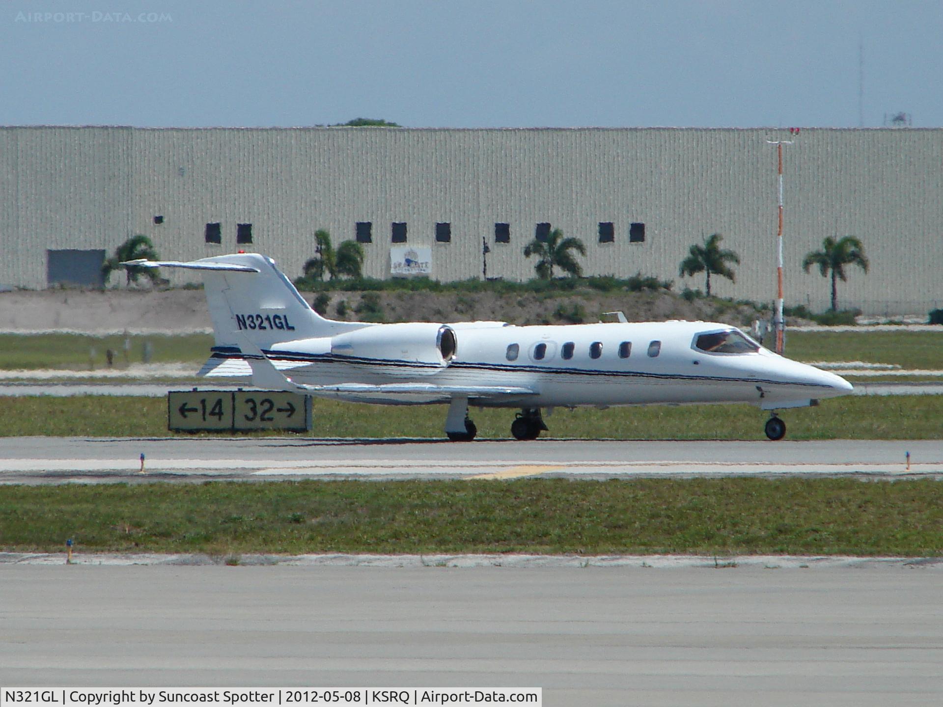N321GL, 2000 Learjet 31A C/N 216, Learjet 31 - N321GL taxis for departure at Sarasota-Bradenton International Airport