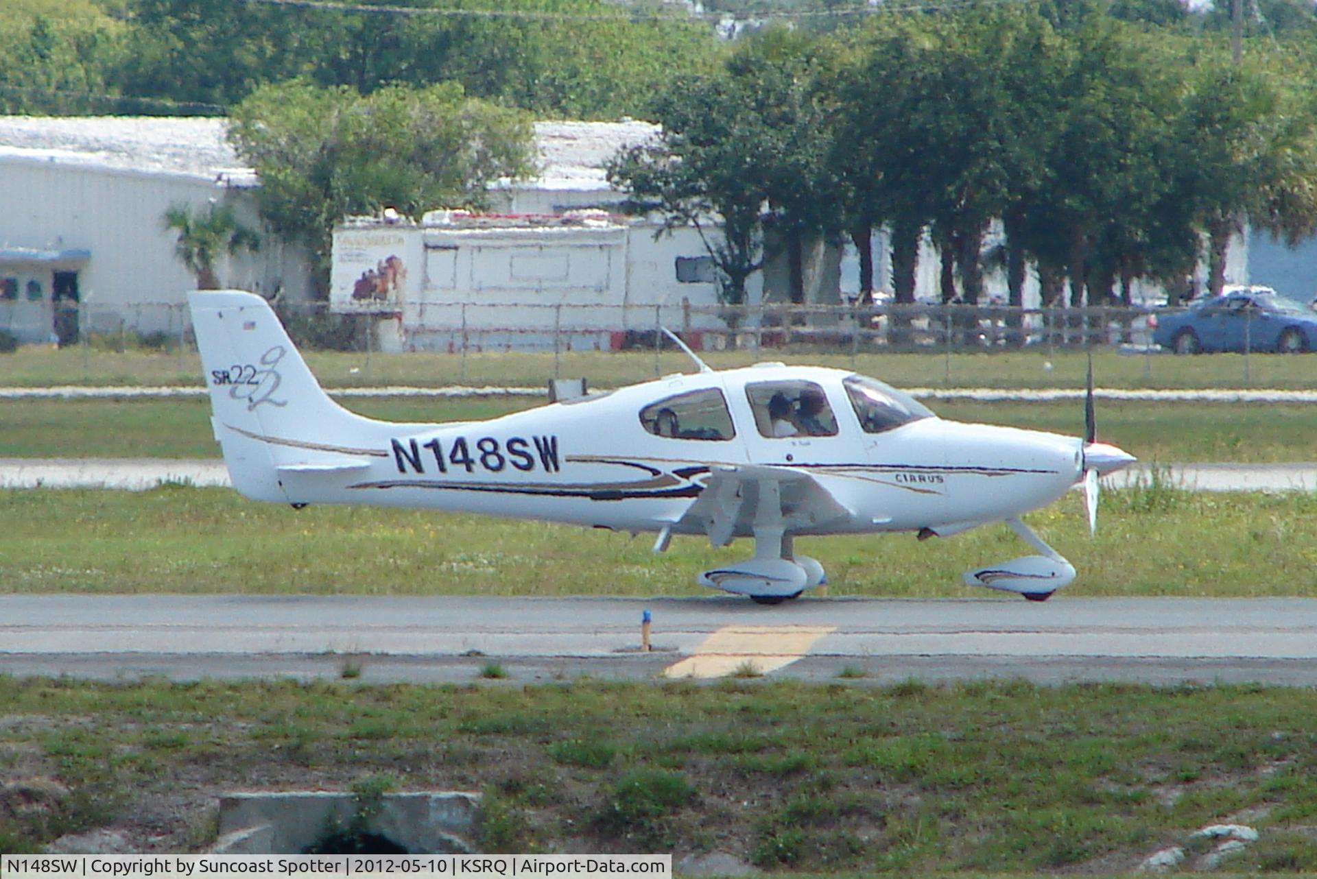 N148SW, 2004 Cirrus SR22 C/N 0987, Cirrus SR-22 taxis for departure at Sarasota-Bradenton International Airport