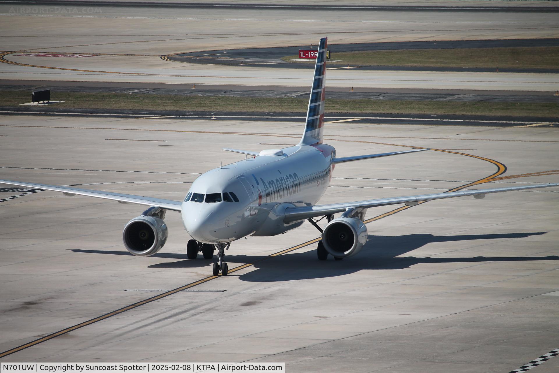 N701UW, 1998 Airbus A319-112 C/N 0890, American Flight 1944 taxis to gate at Tampa International Airport following flight from Reagan National Airport