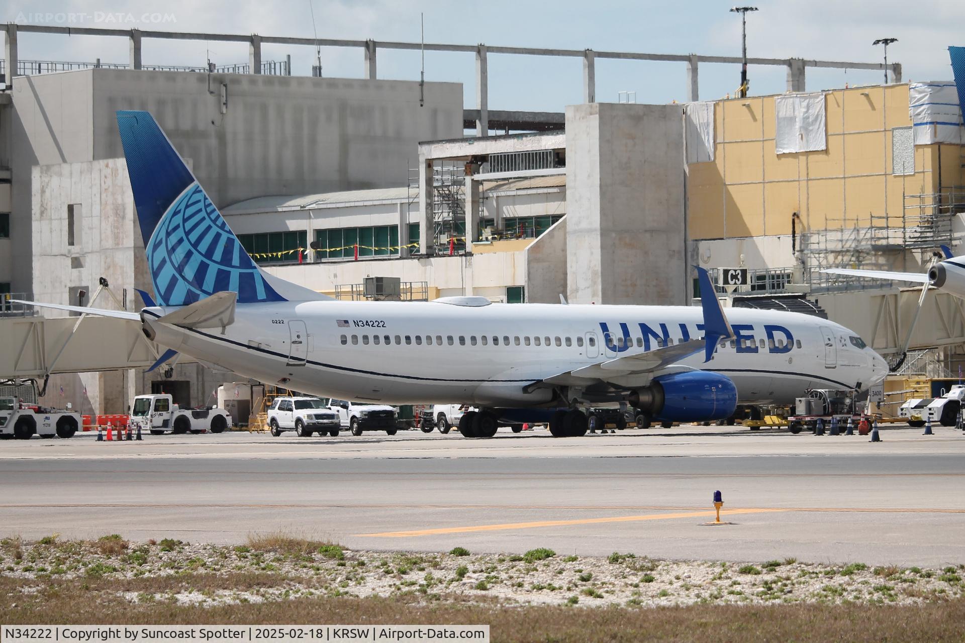 N34222, 1998 Boeing 737-824 C/N 28931, United Flight 1321 sits at Gate C3 at Southwest Florida International Airport prior to flight to Denver International Airport