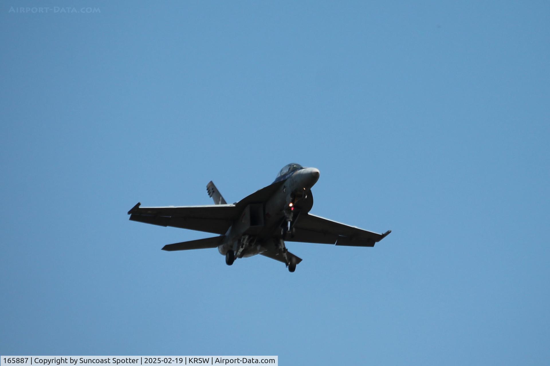 165887, Boeing F/A-18F Super Hornet C/N F047, Roman 31 from Strike Fighter Squadron 106 at Naval Air Station Oceana works in the pattern at Southwest Florida International Airport 