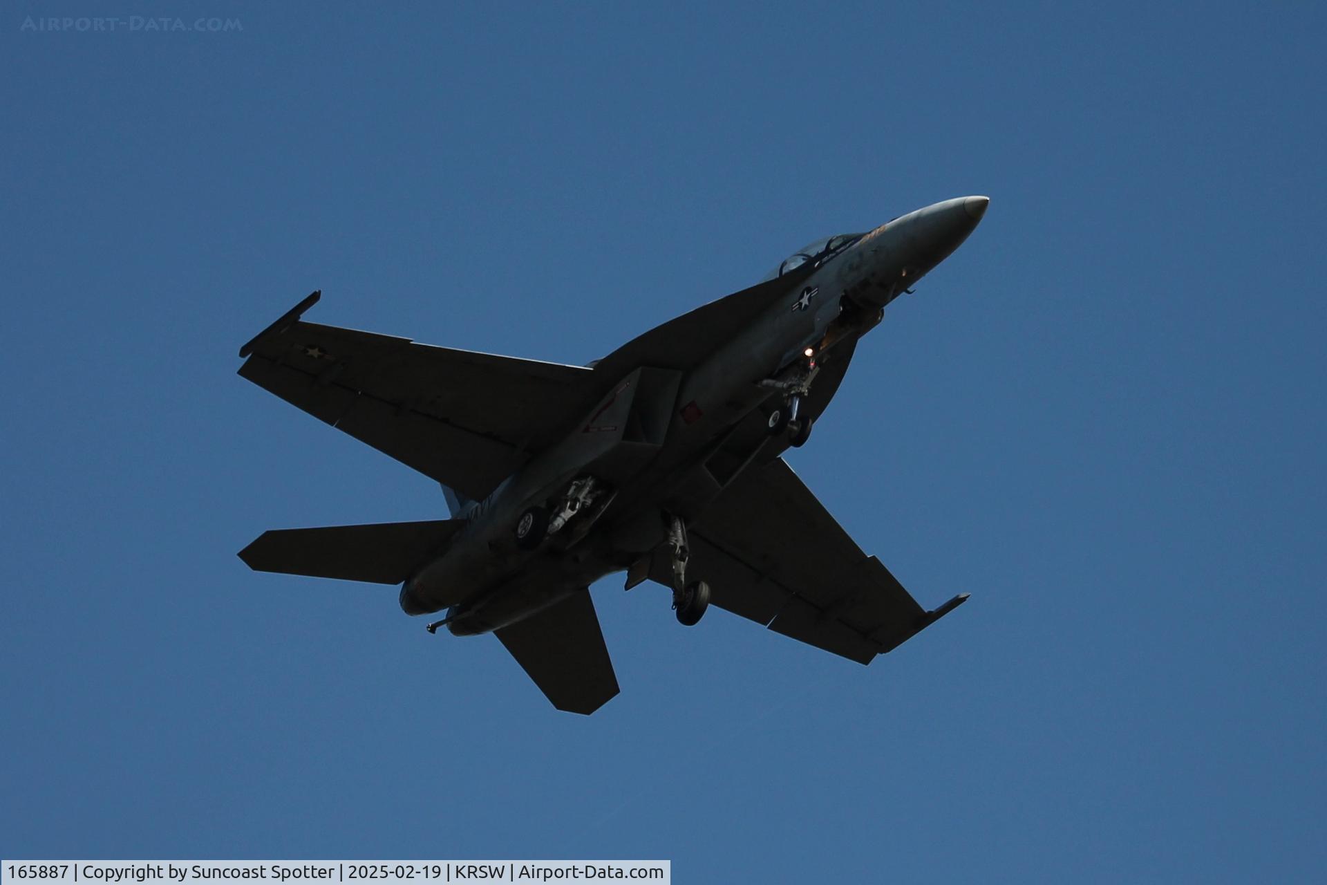 165887, Boeing F/A-18F Super Hornet C/N F047, Roman 31 from Strike Fighter Squadron 106 at Naval Air Station Oceana works in the pattern at Southwest Florida International Airport 