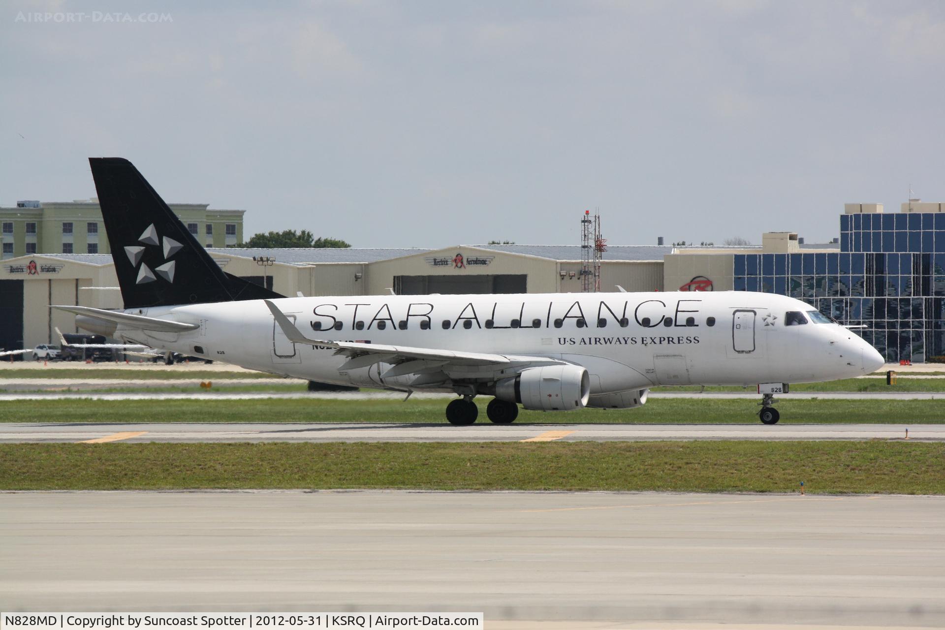 N828MD, 2005 Embraer 170SU (ERJ-170-100SU) C/N 17000048, US Air Flight 3396 operated by Republic Airlines prepares for flight at Sarasota-Bradenton International Airport