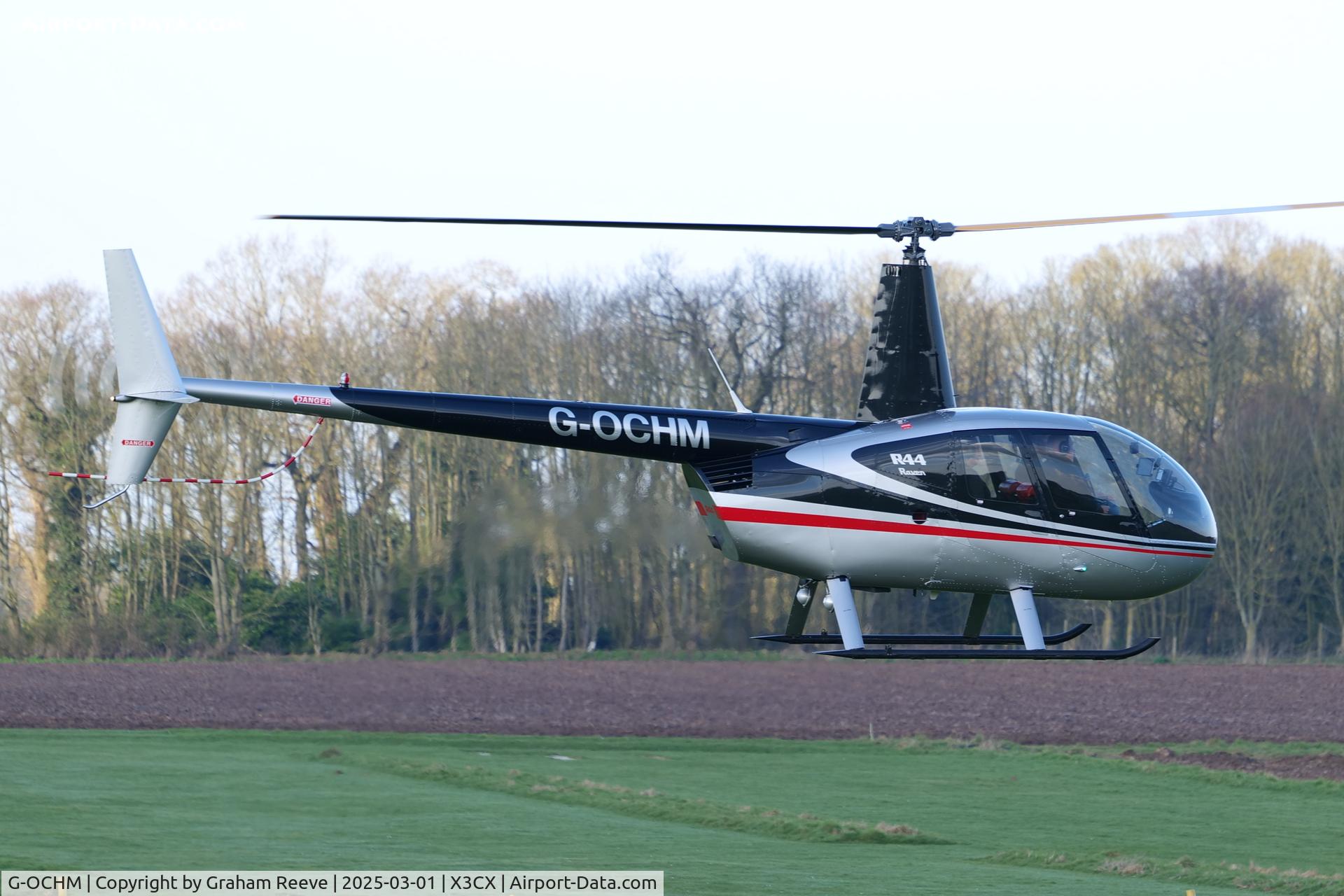 G-OCHM, 2001 Robinson R44 Raven C/N 1055, Departing from Northrepps.