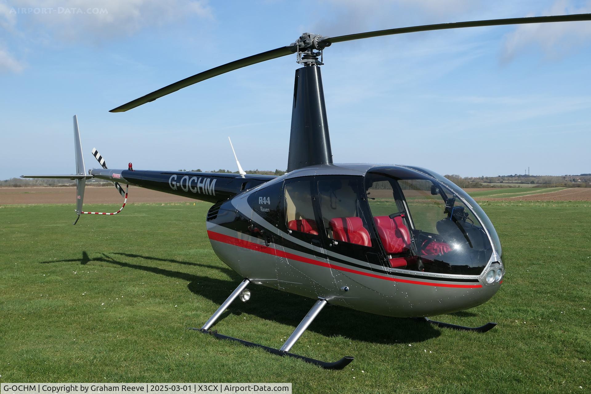 G-OCHM, 2001 Robinson R44 Raven C/N 1055, Parked at Northrepps.