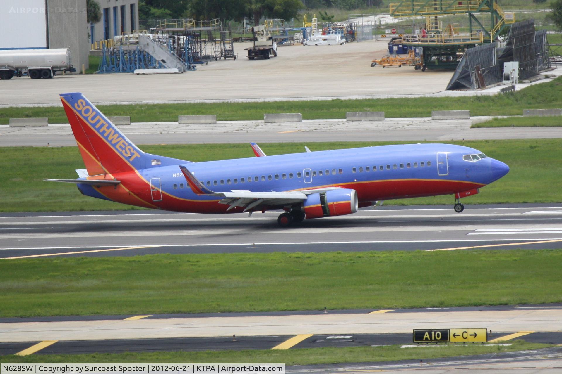 N628SW, 1996 Boeing 737-3H4 C/N 27703, Southwest Flight 3159 arrives on Runway 19L at Tampa International Airport following a flight from New Orleans International Airport