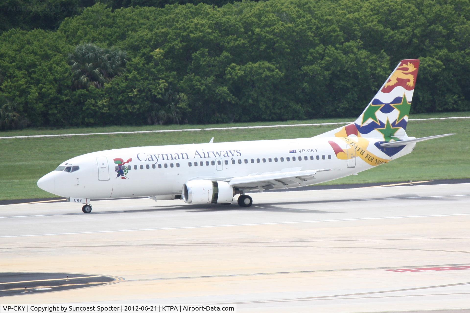 VP-CKY, 1992 Boeing 737-3Q8 C/N 26282, Cayman Flight 200 arrives on Runway 19R at Tampa International Airport following a flight from Owen Roberts International Airport