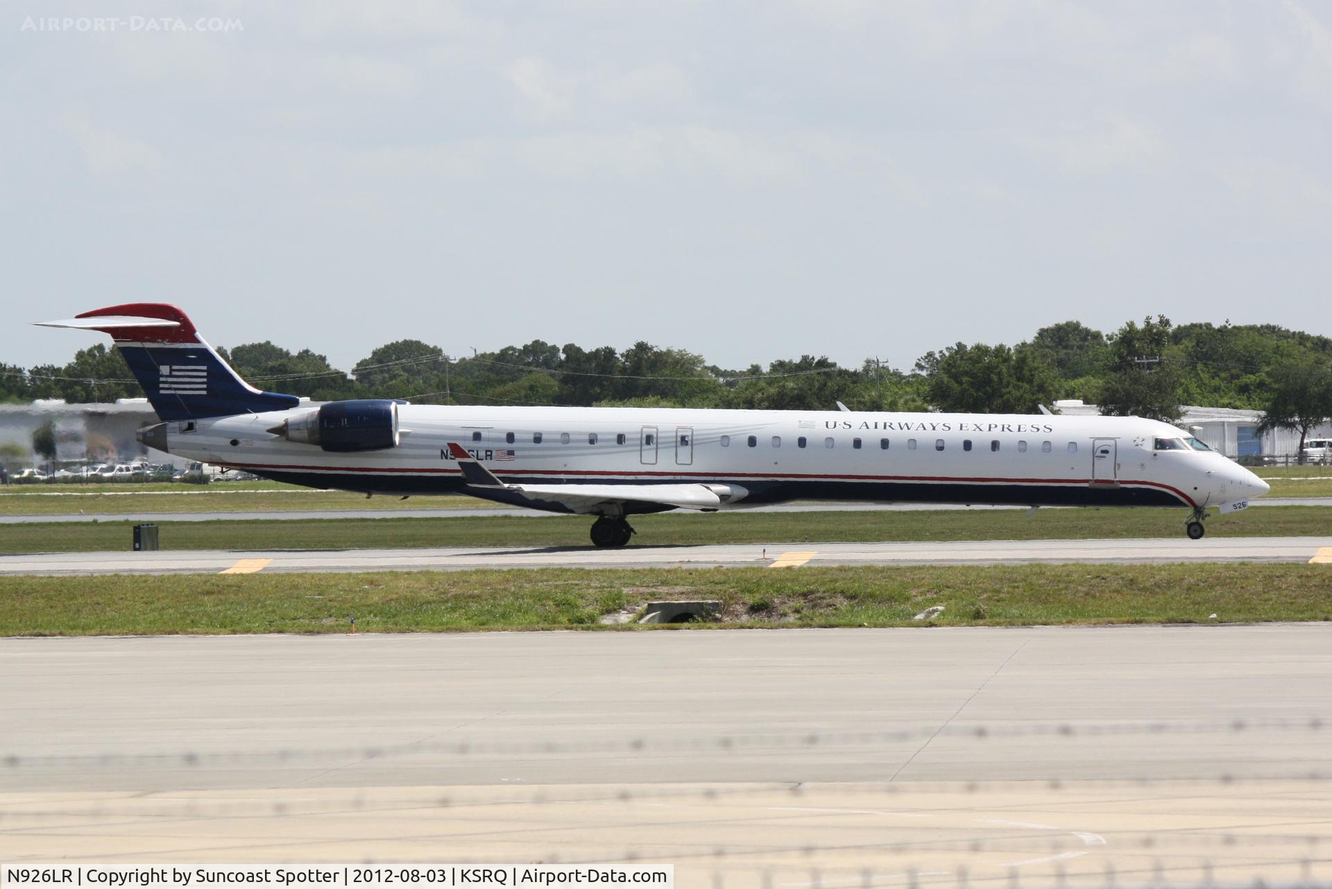 N926LR, 2004 Bombardier CRJ-900ER (CL-600-2D24) C/N 15026, US Air Flight 2709 operated by Mesa taxis for flight at Sarasota-Bradenton International Airport