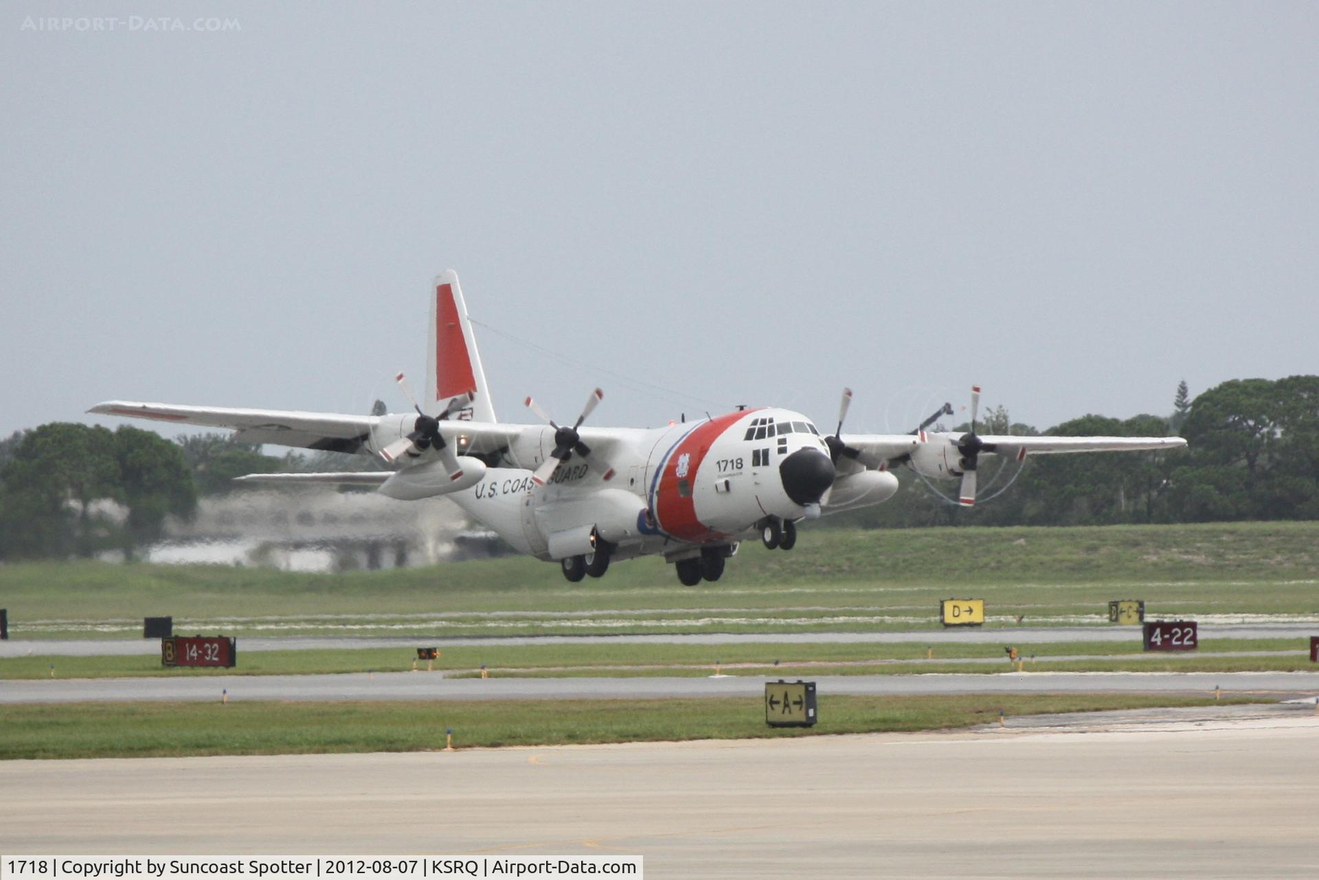 1718, 1986 Lockheed C-130H Hercules C/N 382-5106, US Coast Guard Clearwater 1718 performs a touch and go at Sarasota-Bradenton International Airport