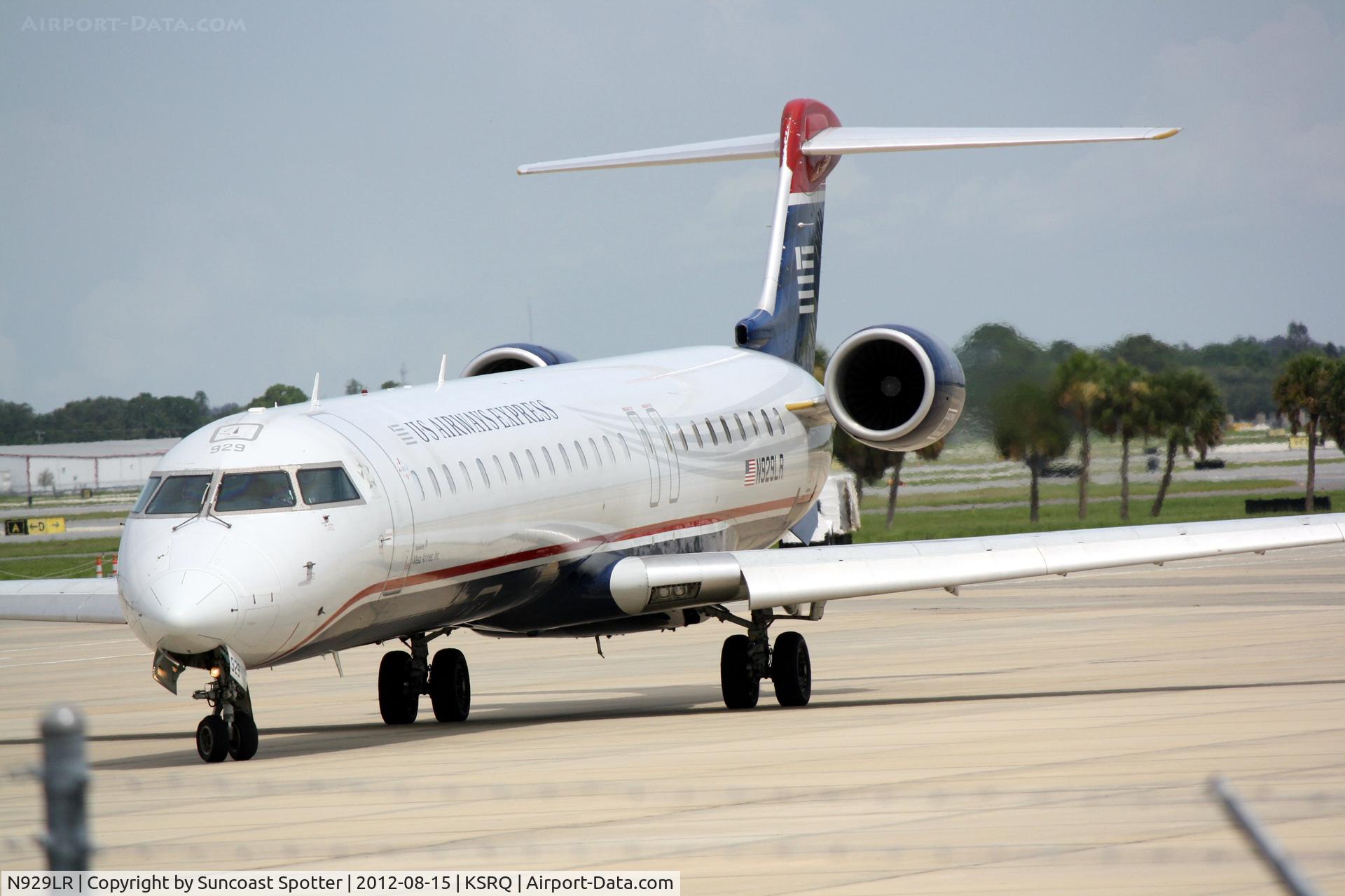 N929LR, 2005 Bombardier CRJ-900ER (CL-600-2D24) C/N 15029, US Air Flight 2709 operated by Mesa prepares for flight at Sarasota-Bradenton International Airport