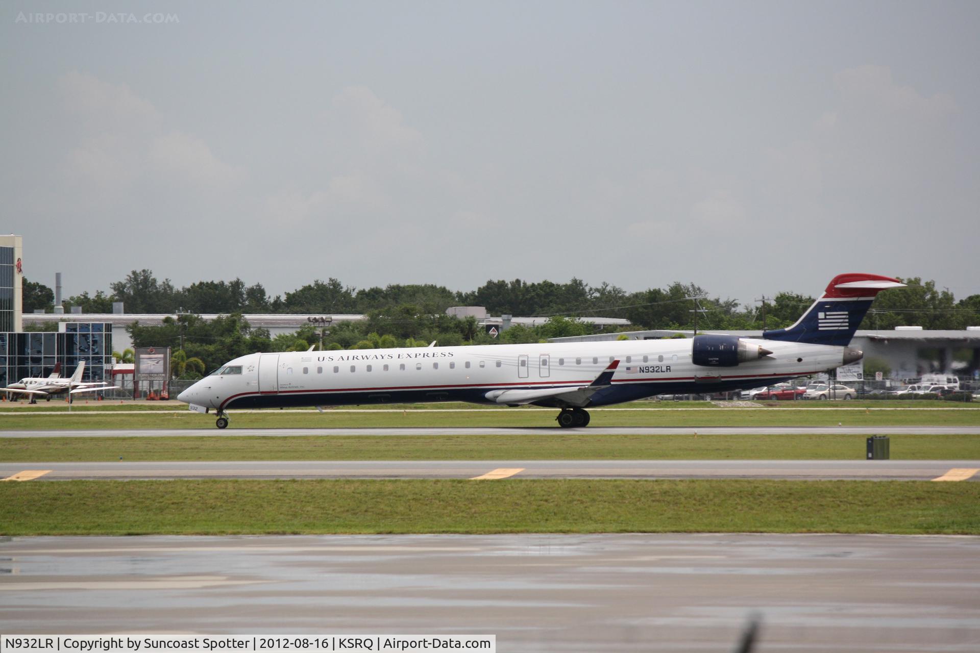 N932LR, 2005 Bombardier CRJ-900ER (CL-600-2D24) C/N 15032, US Air Flight 2709 operated by Mesa prepares for flight at Sarasota-Bradenton International Airport