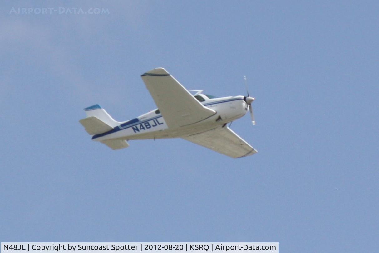 N48JL, 1971 Beech G33 C/N CD-1256, Bonanza departs Sarasota-Bradenton International Airport