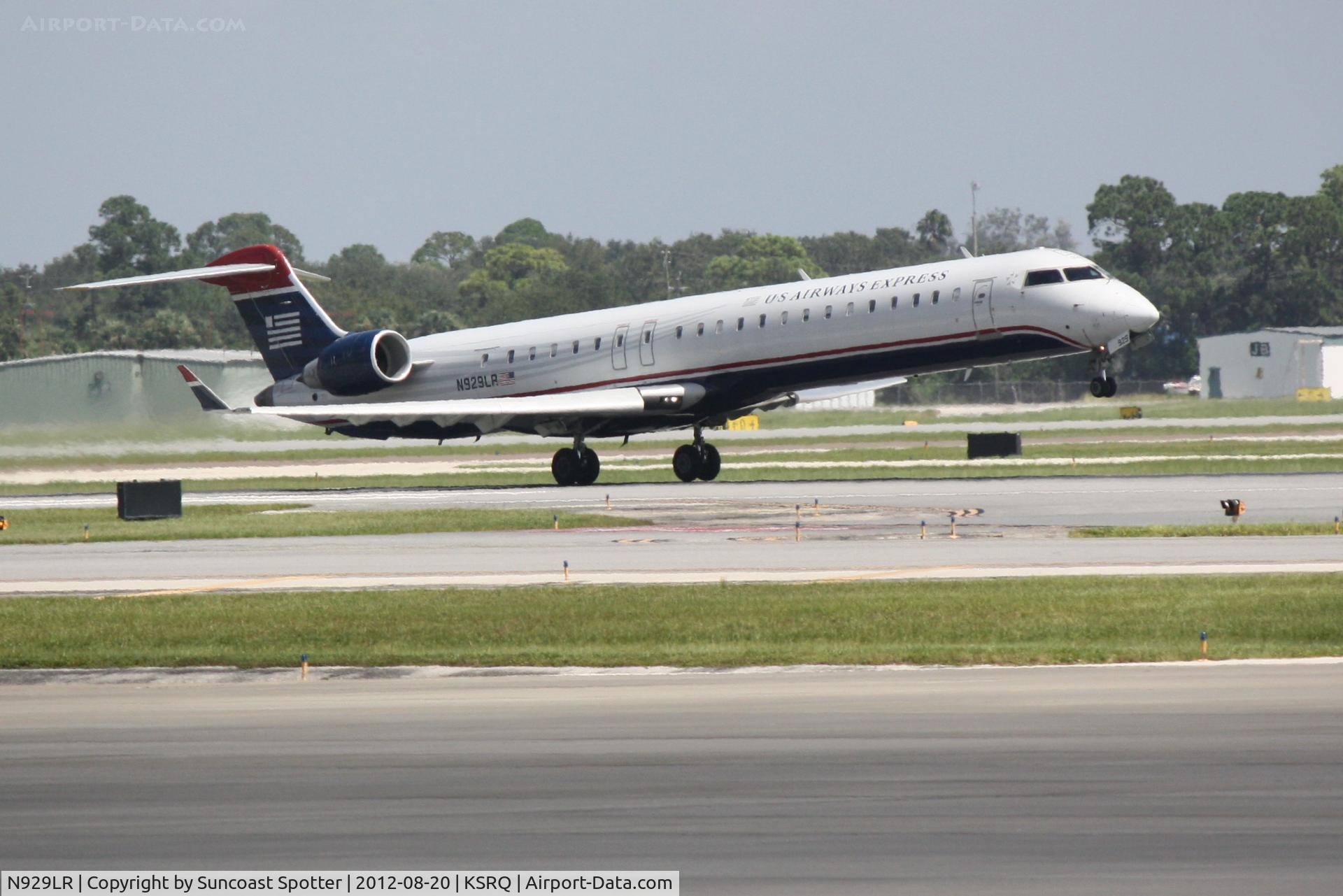N929LR, 2005 Bombardier CRJ-900ER (CL-600-2D24) C/N 15029, US Air Flight 2709 operated by Mesa departs Sarasota-Bradenton International Airport enroute to Charlotte-Douglas International Airport