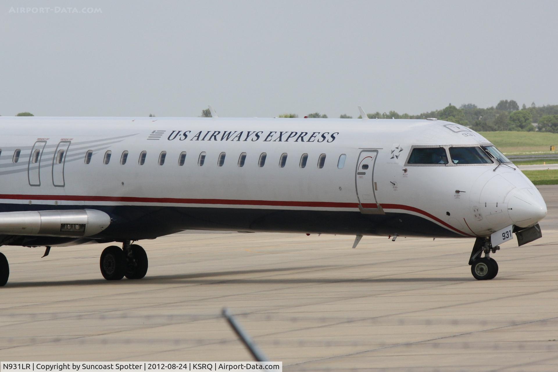 N931LR, 2005 Bombardier CRJ-900ER (CL-600-2D24) C/N 15031, US Air Flight 2607 operated by Mesa  prepares for flight at Sarasota-Bradenton International Airport
