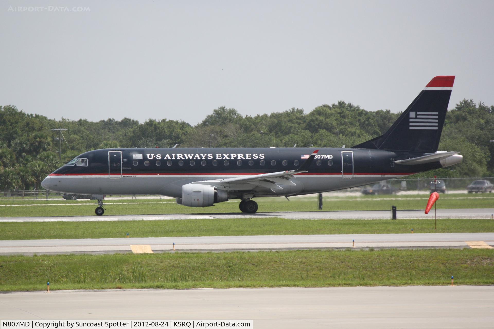 N807MD, 2004 Embraer 170SU (ERJ-170-100SU) C/N 17000020, US Air Flight 3396 operated by Republic departs Sarasota-Bradenton International Airport enroute to Reagan National Airport