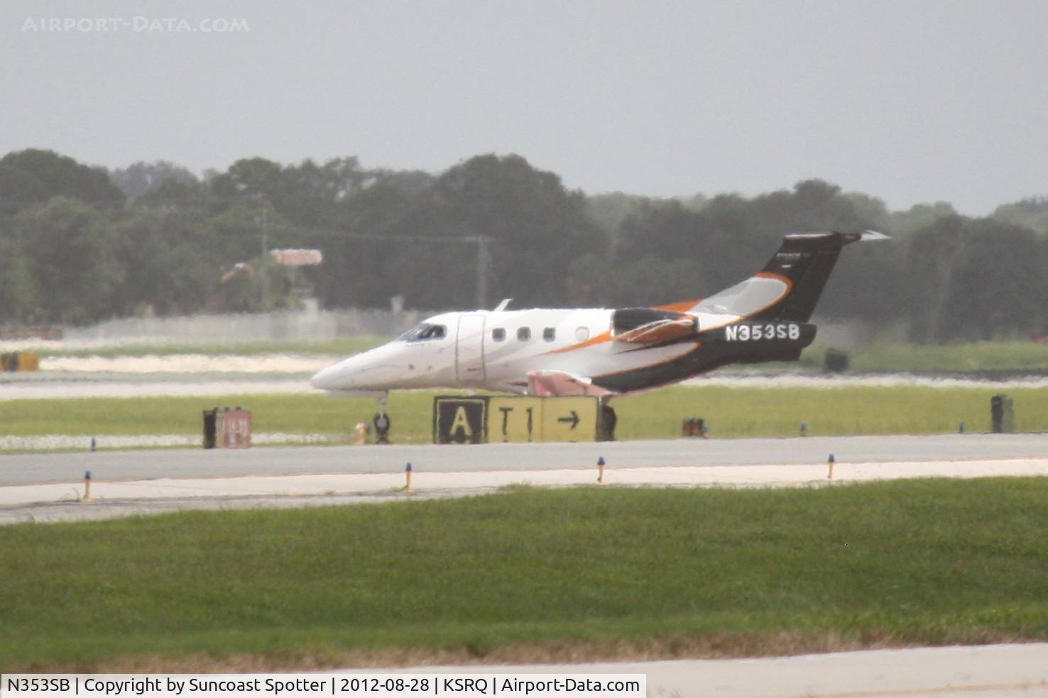 N353SB, 2009 Embraer EMB-500 Phenom 100 C/N 50000038, Embraer Phenom 100 departs Sarasota-Bradenton International Airport enroute to Lakeland Linder Airport