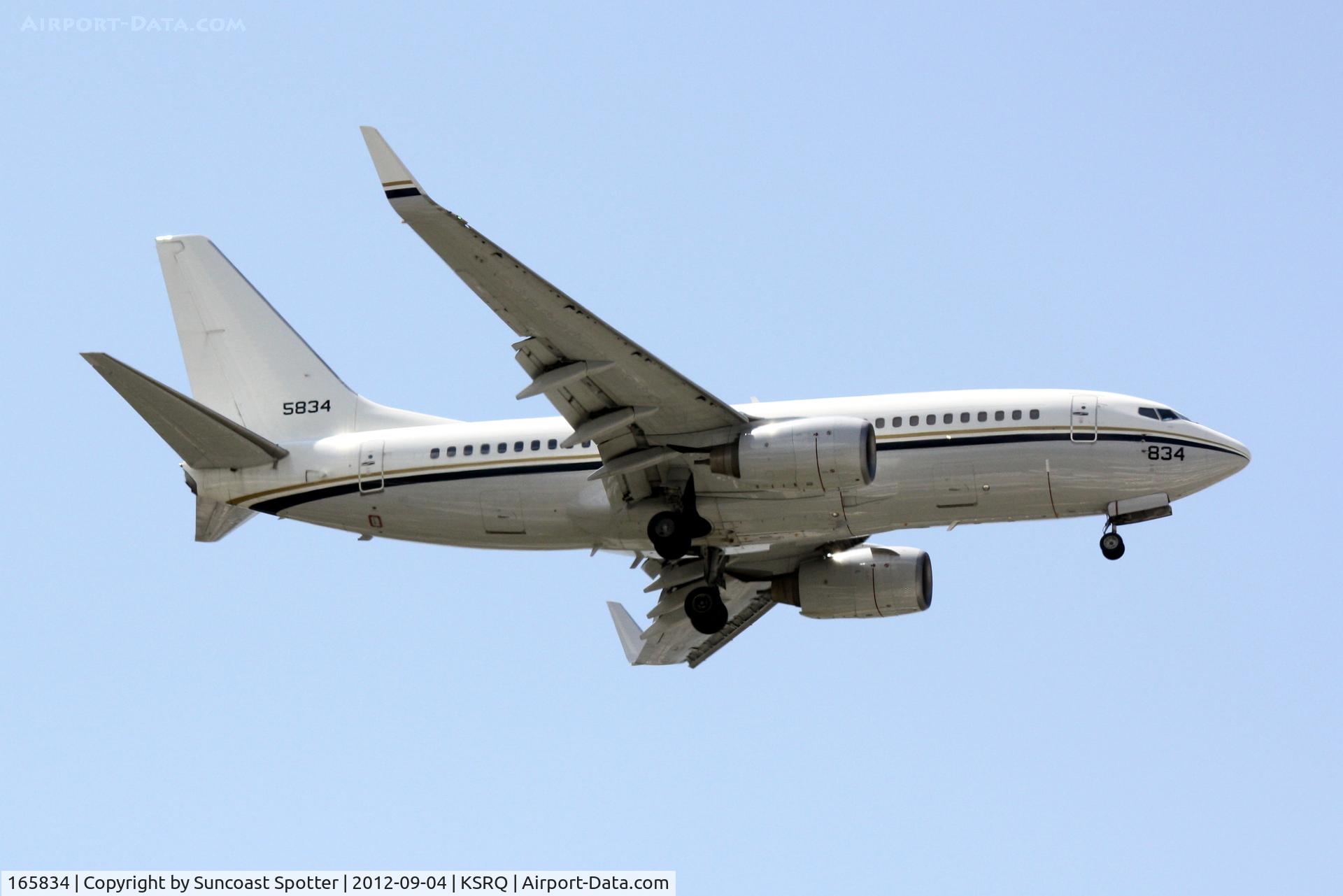 165834, 2002 Boeing C-40A Clipper C/N 32598, A US Navy C-40 Clipper performs touch and go landings at Sarasota-Bradenton International Airport