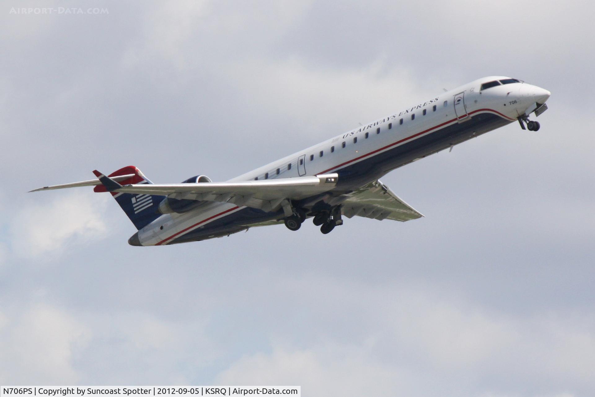 N706PS, 2004 Bombardier CRJ-701 (CL-600-2C10) Regional Jet C/N 10150, US Air Flight 2224 operated by PSA departs Sarasota-Bradenton International Airport enroute to Charlotte-Douglas International Airport