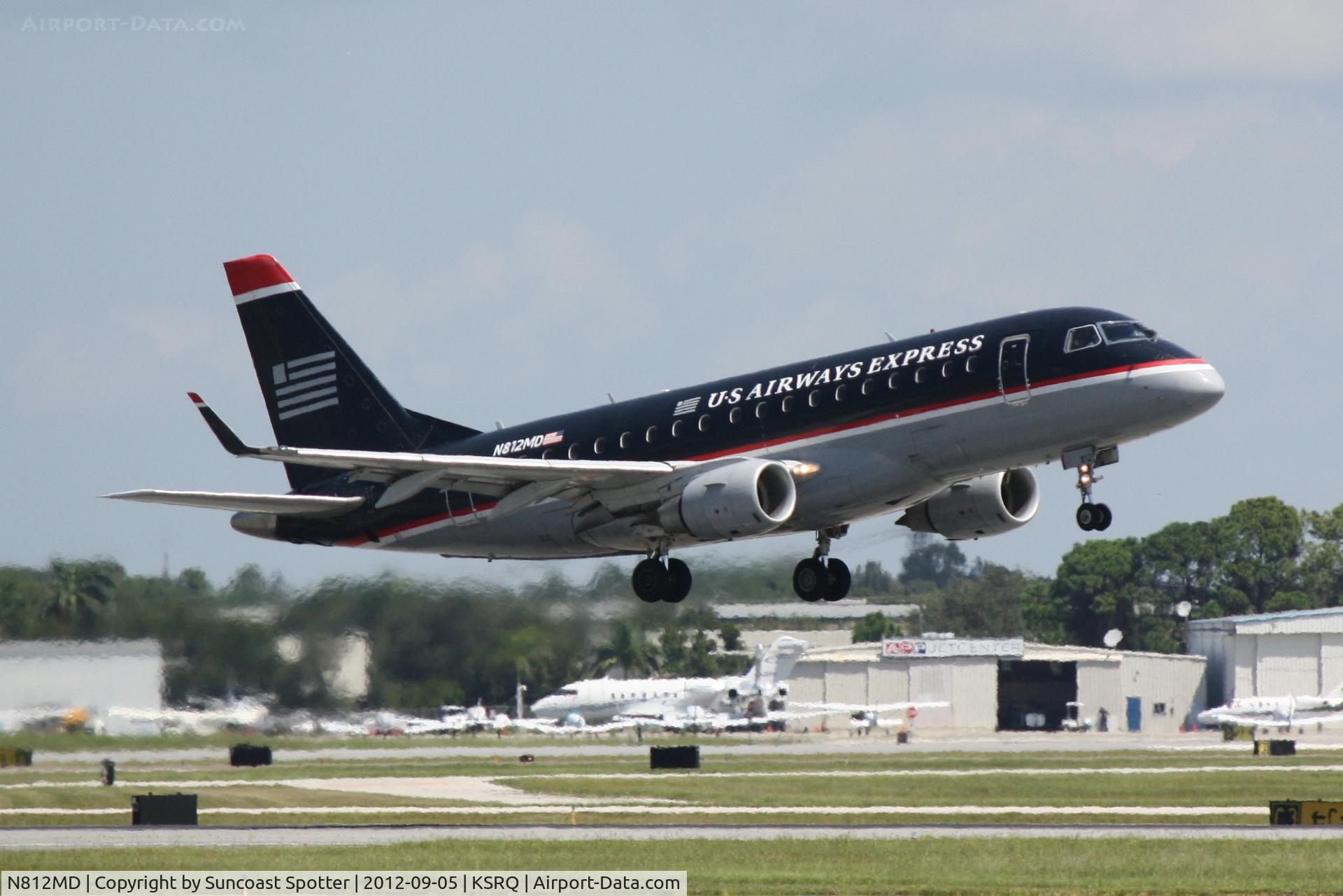 N812MD, 2004 Embraer 170SU (ERJ-170-100SU) C/N 17000030, Republic departs SRQ