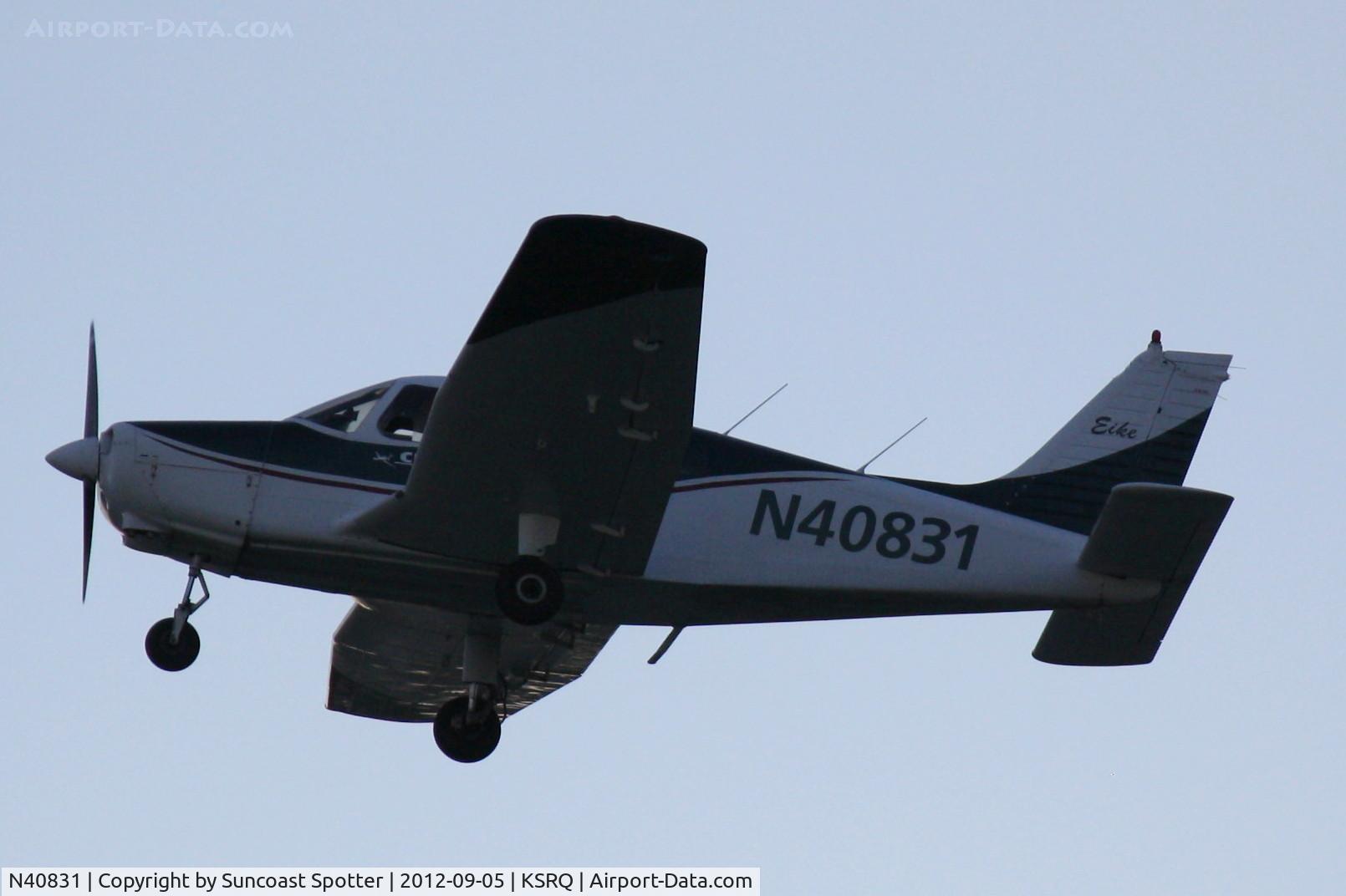 N40831, 1973 Piper PA-28-151 C/N 28-7415092, Piper Cherokee departs Sarasota-Bradenton International Airport