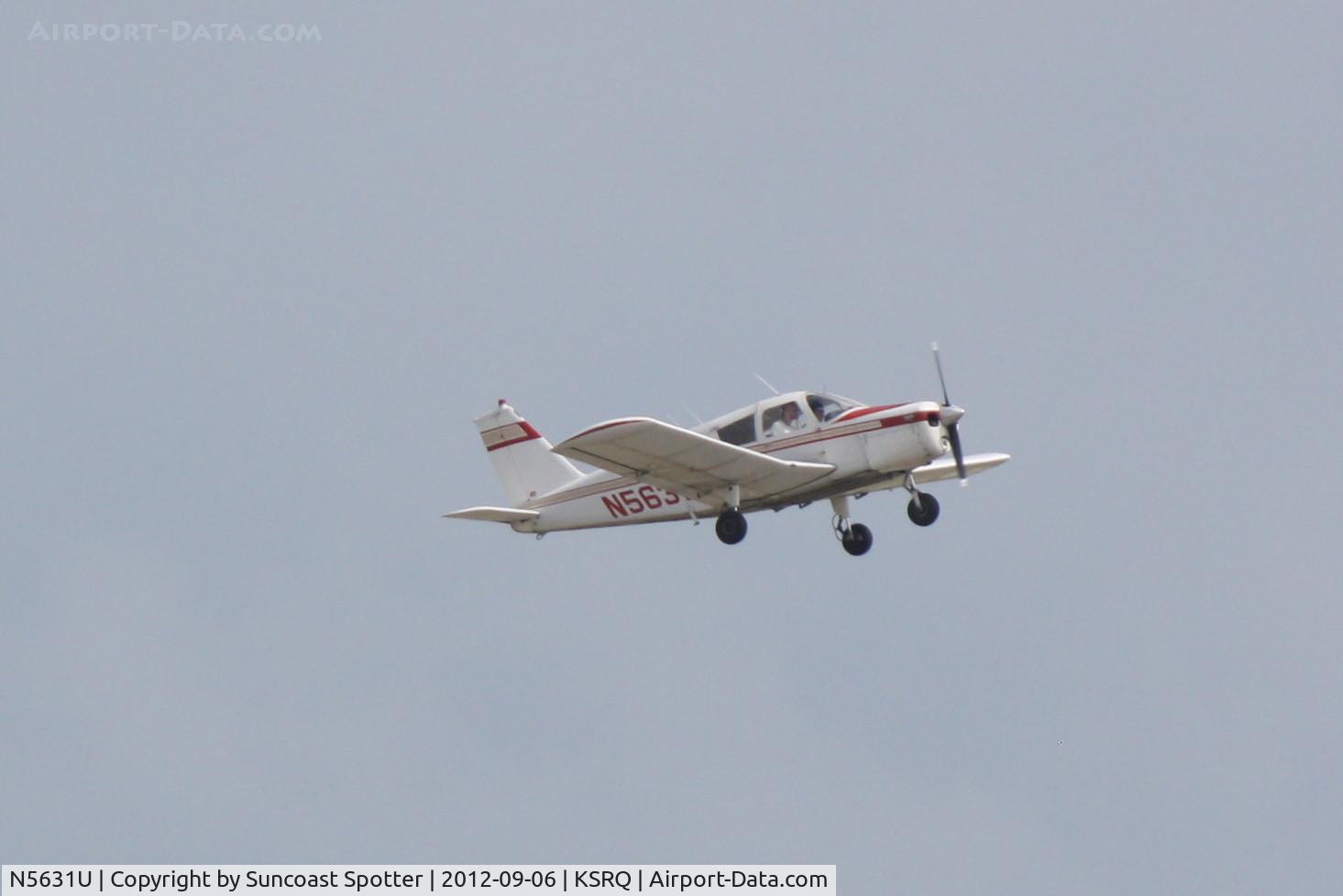 N5631U, 1969 Piper PA-28-140 C/N 28-26427, Piper Cherokee departs Sarasota-Bradenton International Airport