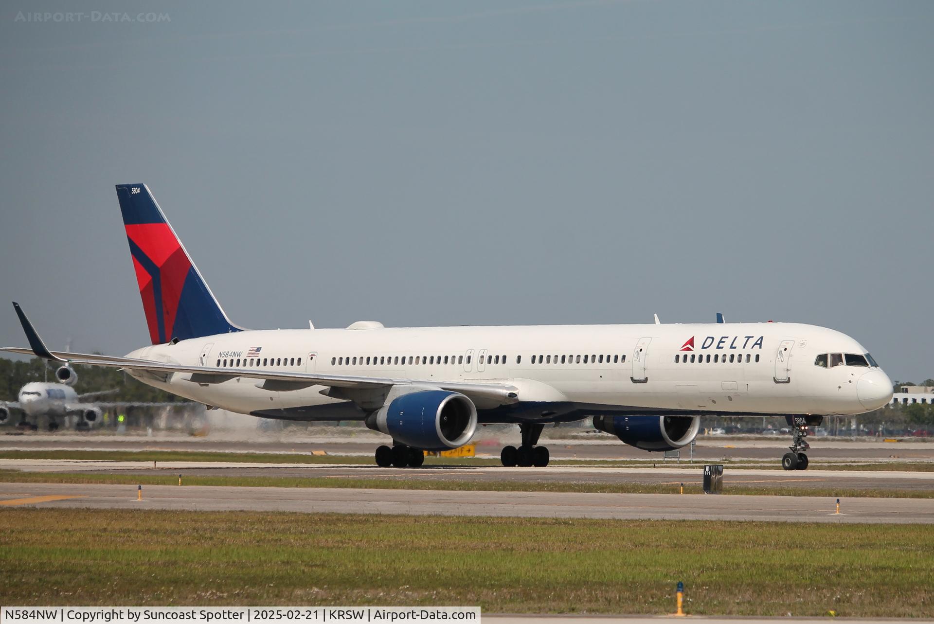 N584NW, 2002 Boeing 757-351 C/N 32984, Delta Flight 719 taxis at Southwest Florida International Airport following flight from Detroit Metro Airport