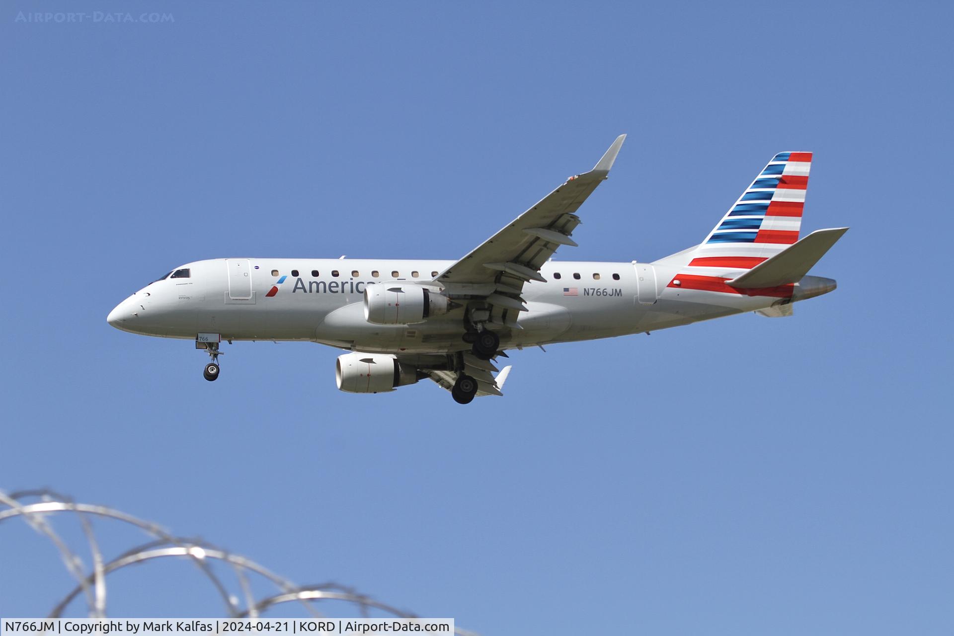 N766JM, 2010 Embraer 170STD (ERJ-170-100STD) C/N 1700305, E170 Envoy/ American Eagle EMBRAER ERJ 170-100 STD N766JM on approach to 28C