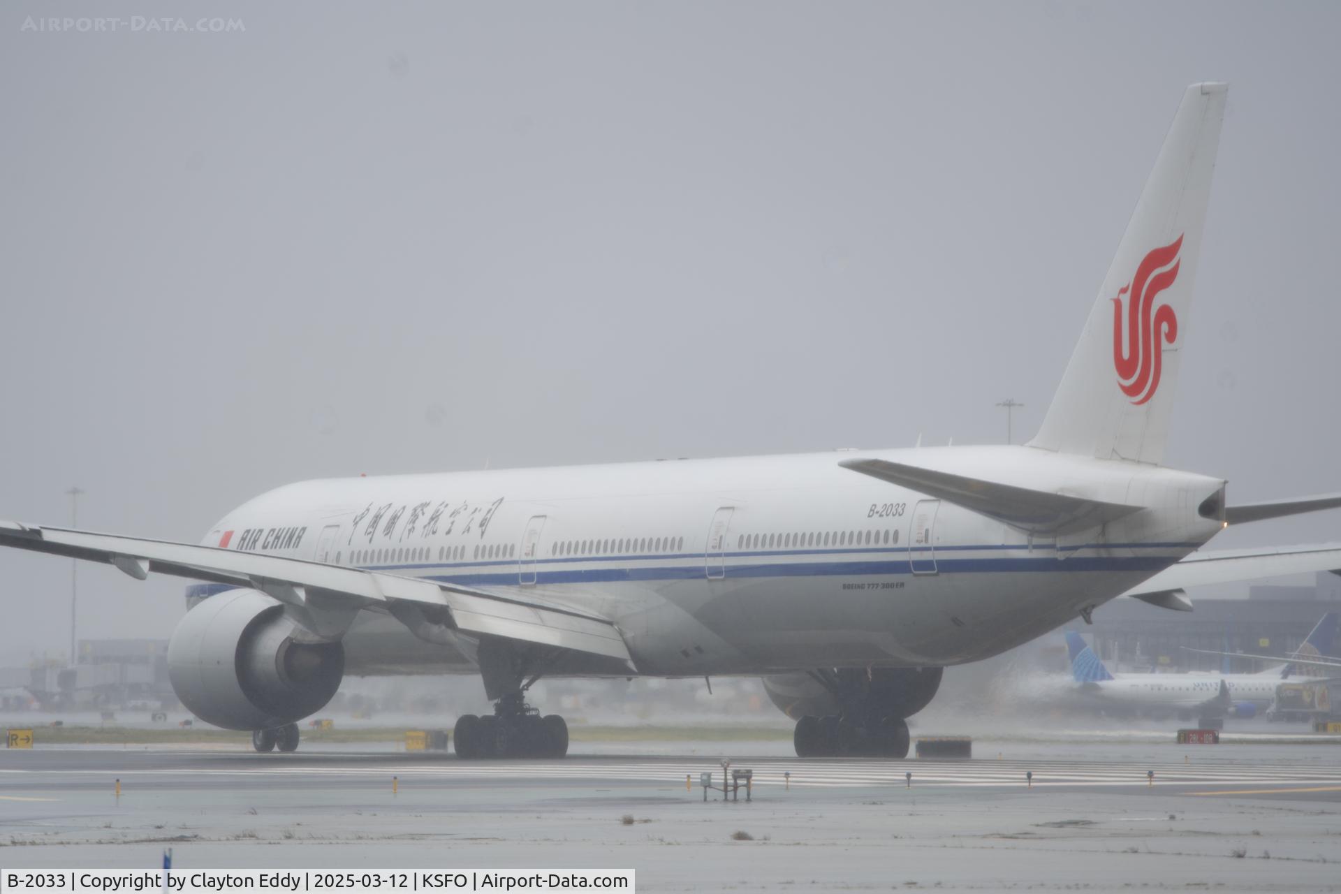 B-2033, 2012 Boeing 777-39L/ER C/N 38673, Raining departing runeay 10 SFO 2025