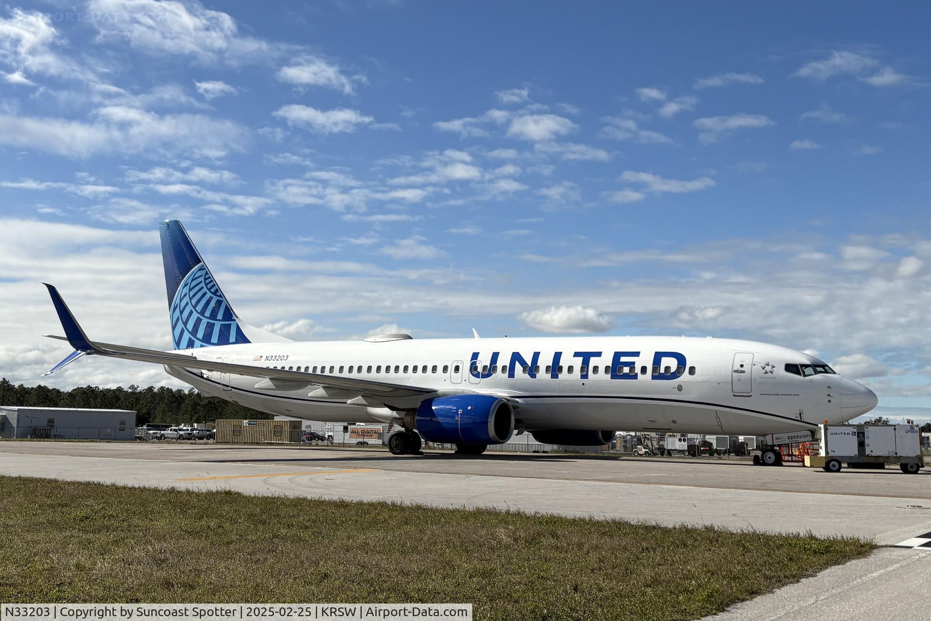 N33203, 2000 Boeing 737-824 C/N 30613, United Boeing 737 parked in remote parking at Southwest Florida International Airport