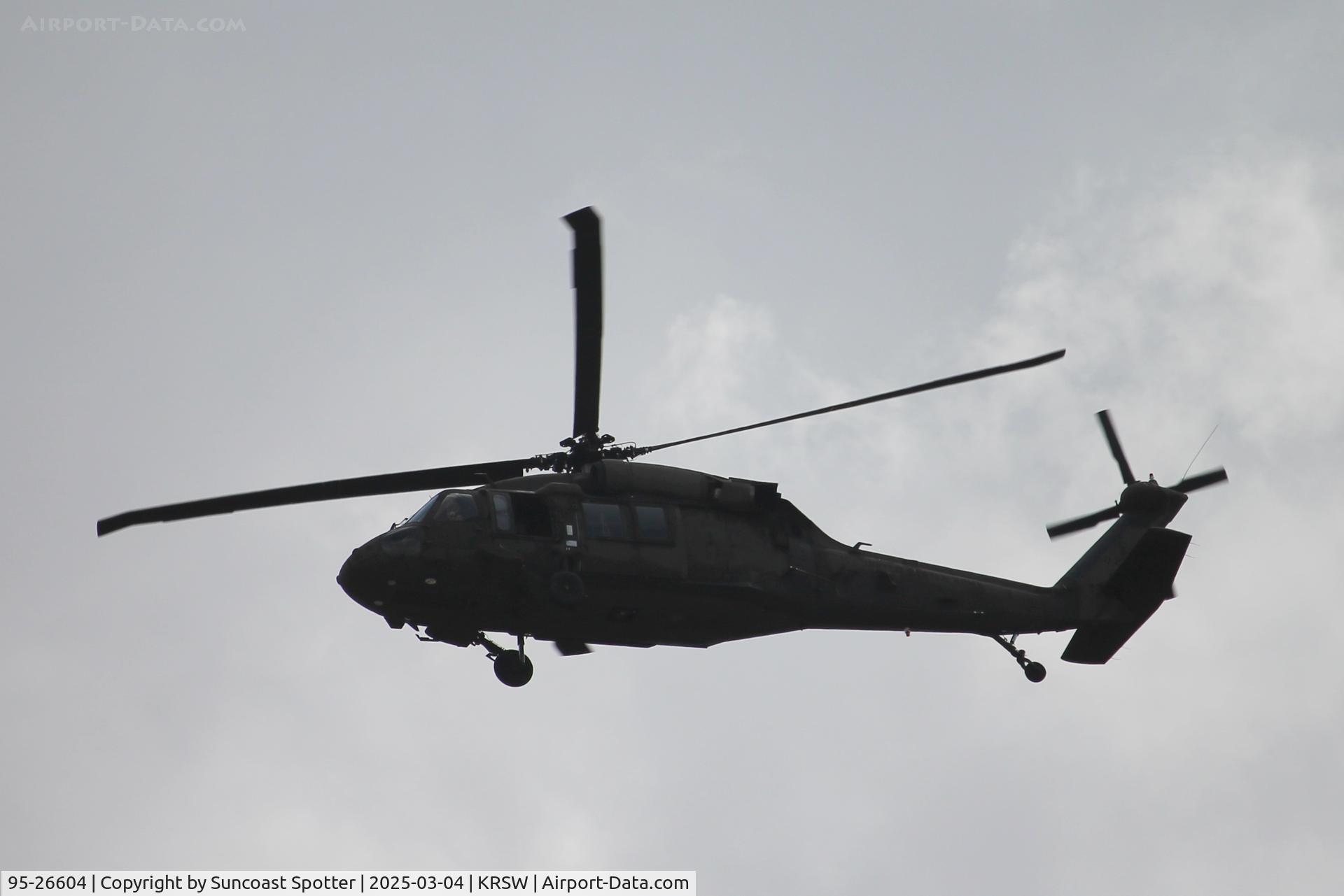 95-26604, 1995 Sikorsky UH-60L Black Hawk C/N 702121, Guard 26604 performs a missed approach to Runway 6 at Southwest Florida International Airport