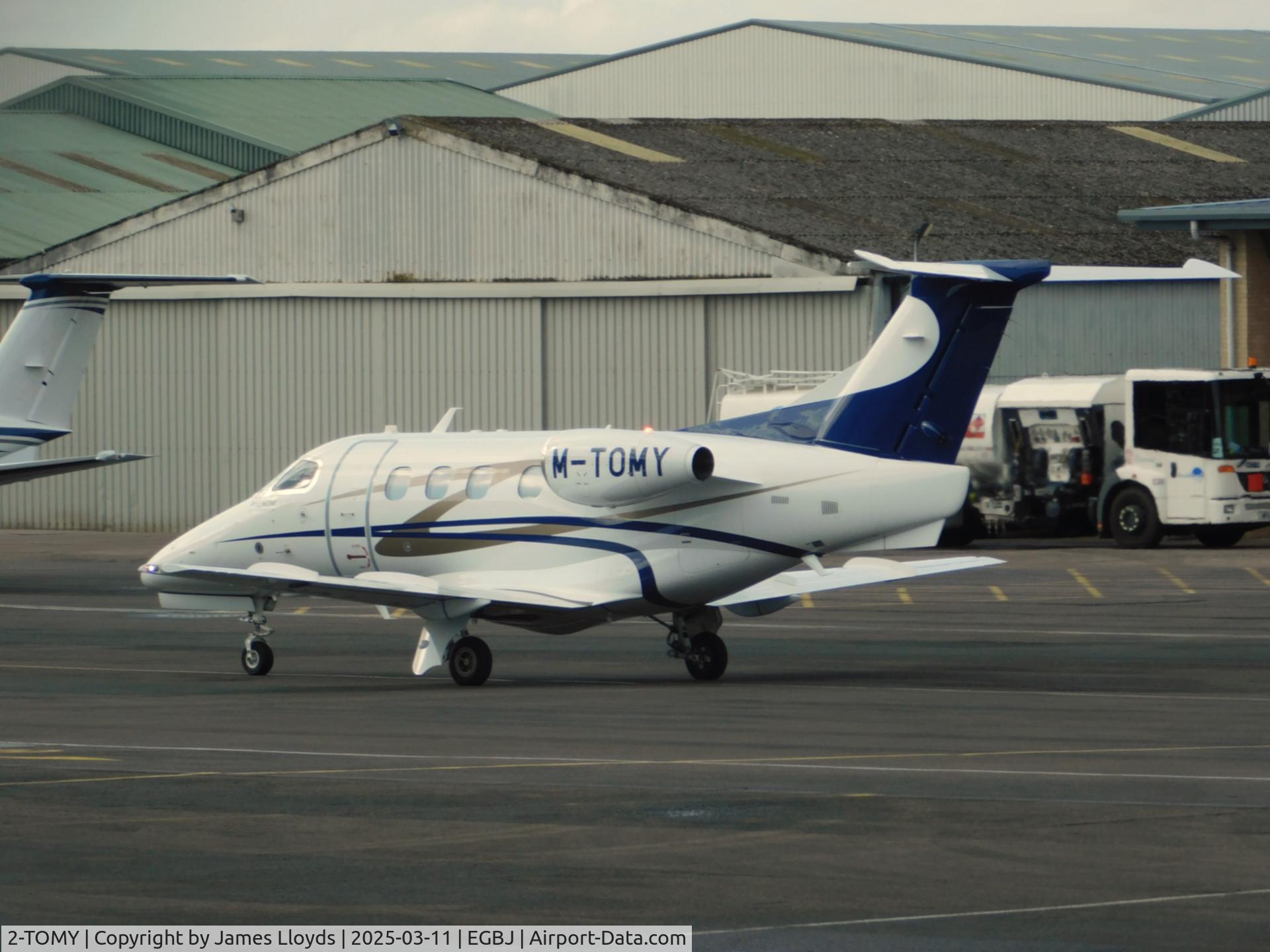 2-TOMY, 2016 Embraer EMB-500 Phenom 100 C/N 50000371, Taxing in at Gloucestershire Airport for the Cheltenham Gold Cup