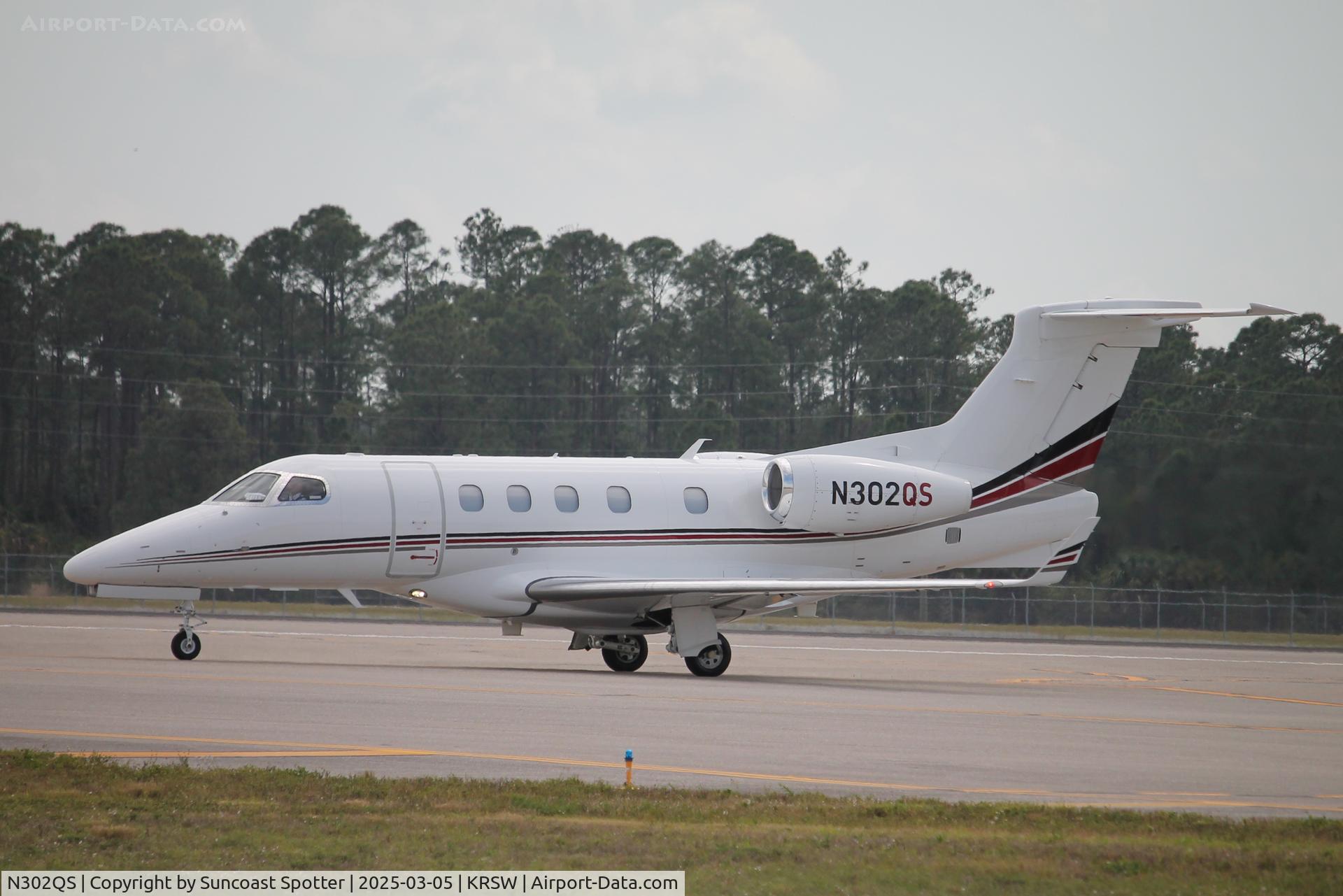 N302QS, 2013 Embraer EMB-505 Phenom 300 C/N 50500123, NetJets Flight 302 taxis at Southwest Florida International Airport prior to flight to Lynden Pindling International Airport