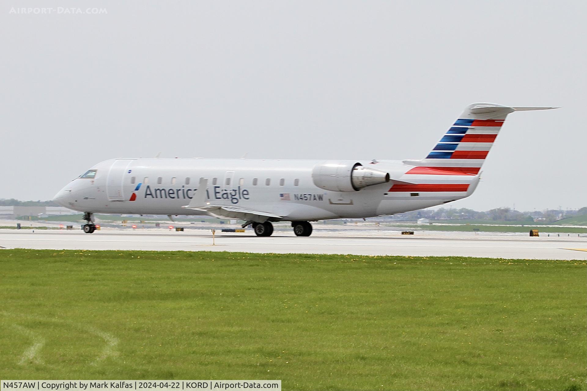 N457AW, 2003 Canadair CRJ-200LR (CL-600-2B19) C/N 7854, CRJ2 Air Wisconsin/American Eagle Canadair Regional Jet CRJ-200 N457AW departing 22L KORD