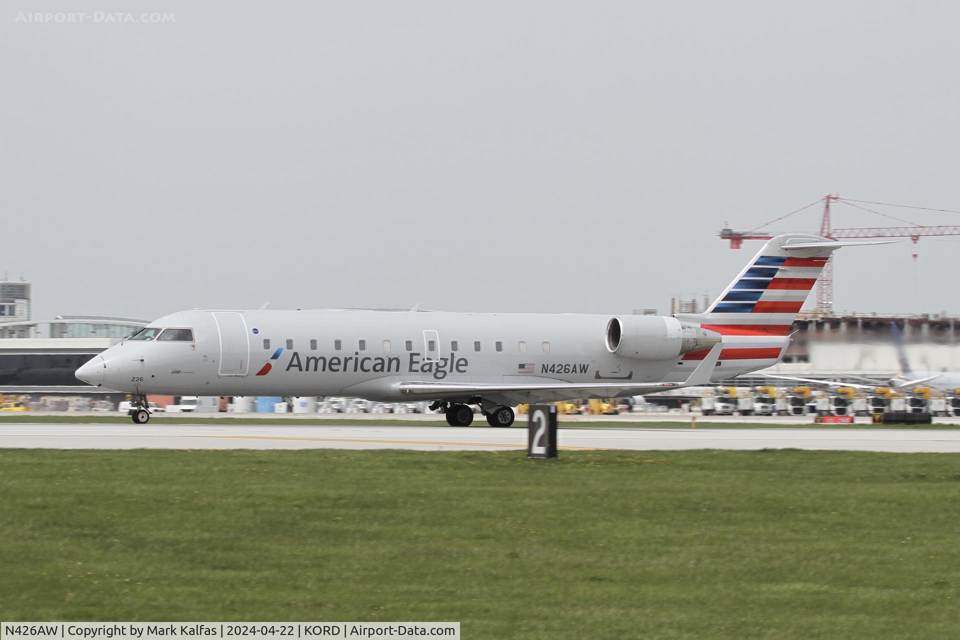 N426AW, 2002 Bombardier CRJ-200LR (CL-600-2B19) C/N 7669, CRJ2 Air Wisconsin/ American Eagle BOMBARDIER INC CL-600-2B19 N426AW departing 22L KORD