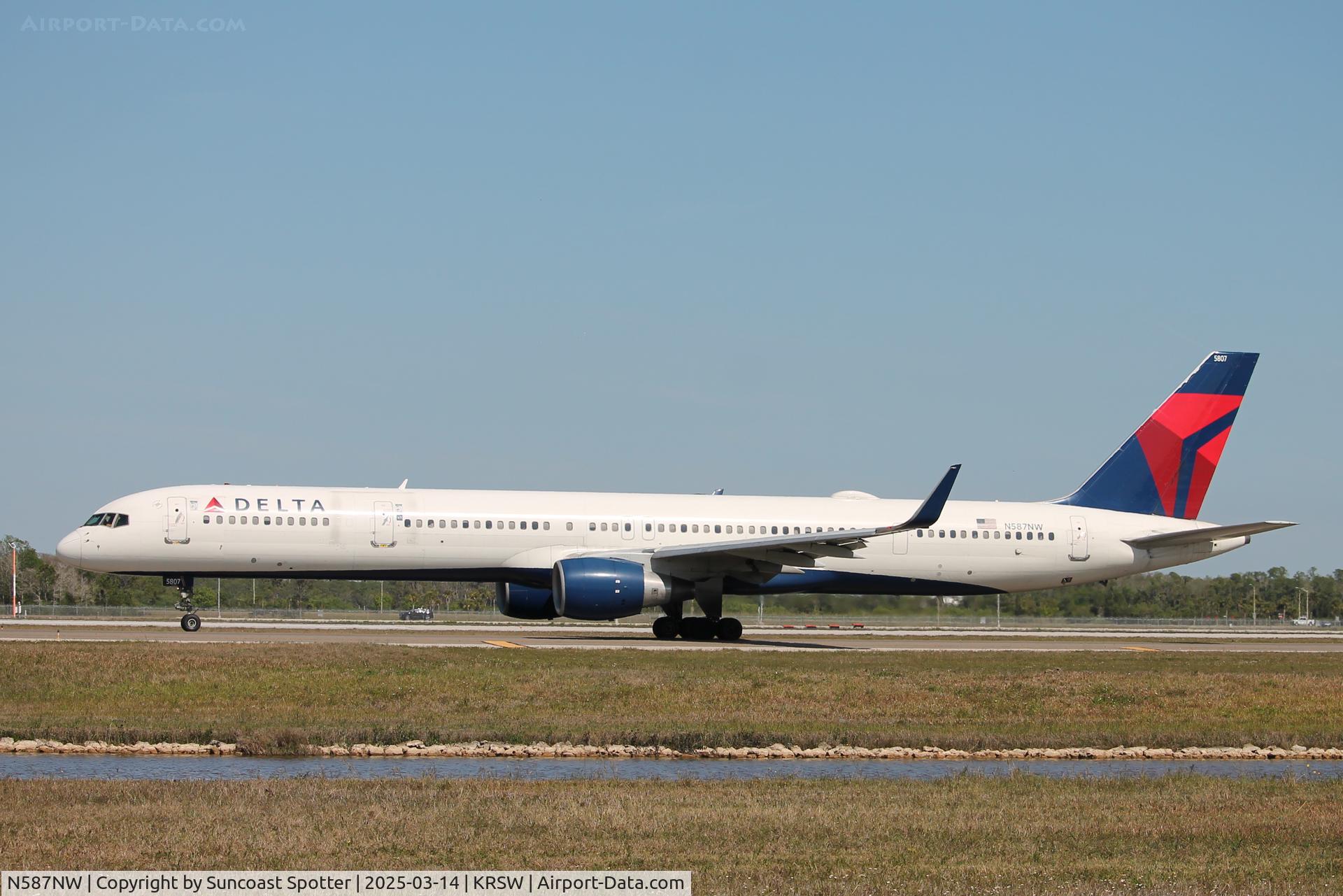 N587NW, 2002 Boeing 757-351 C/N 32986, Delta Flight 880 taxis at Southwest Florida International Airport prior to flight to Minneapolis-St Paul International Airport