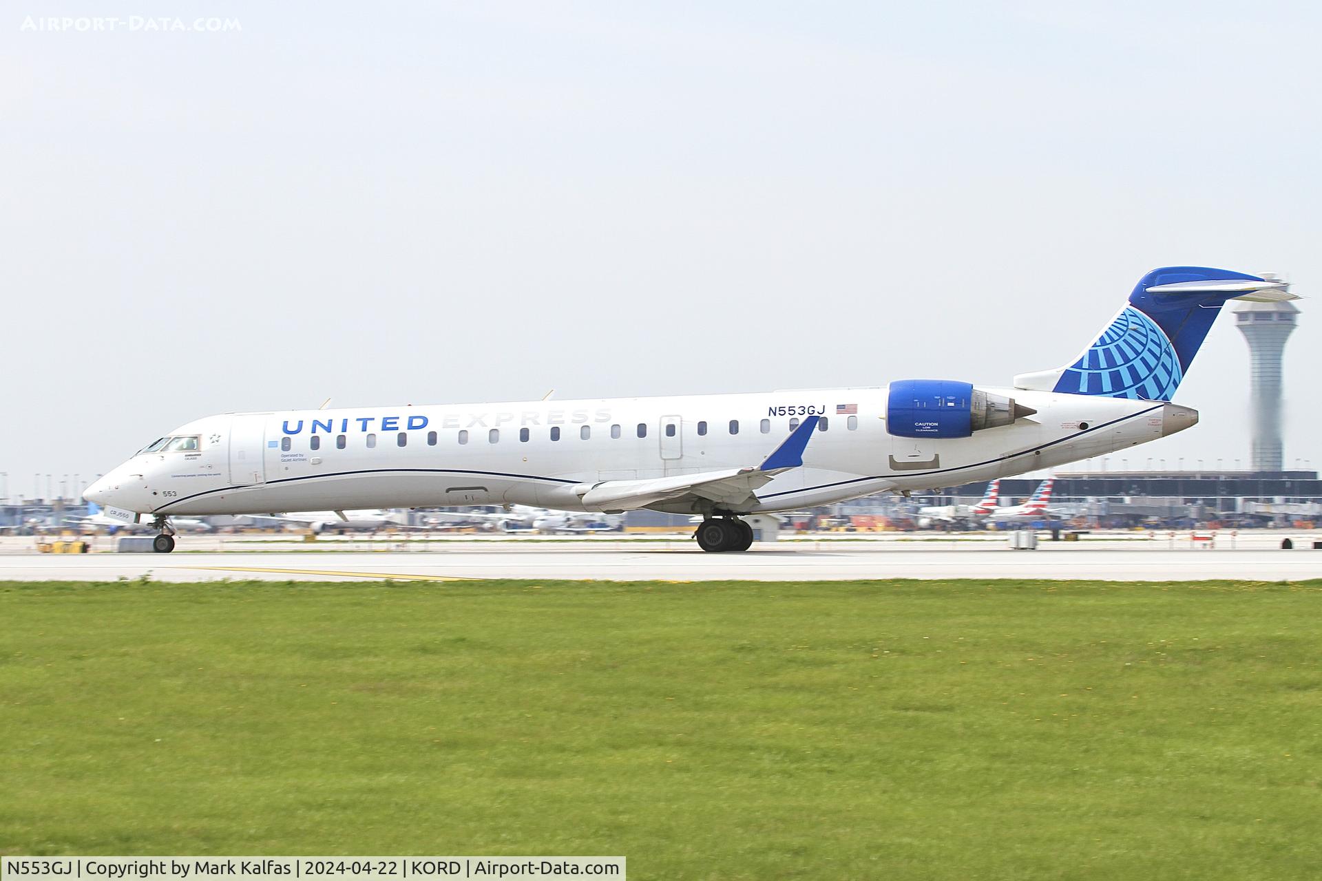 N553GJ, Bombardier CRJ-701ER (CL-600-2C10) Regional Jet C/N 10296, CRJ7 GoJet/United Express Bombardier CRJ-701, CL-600-2C11 N553GJ departing 22L KORD