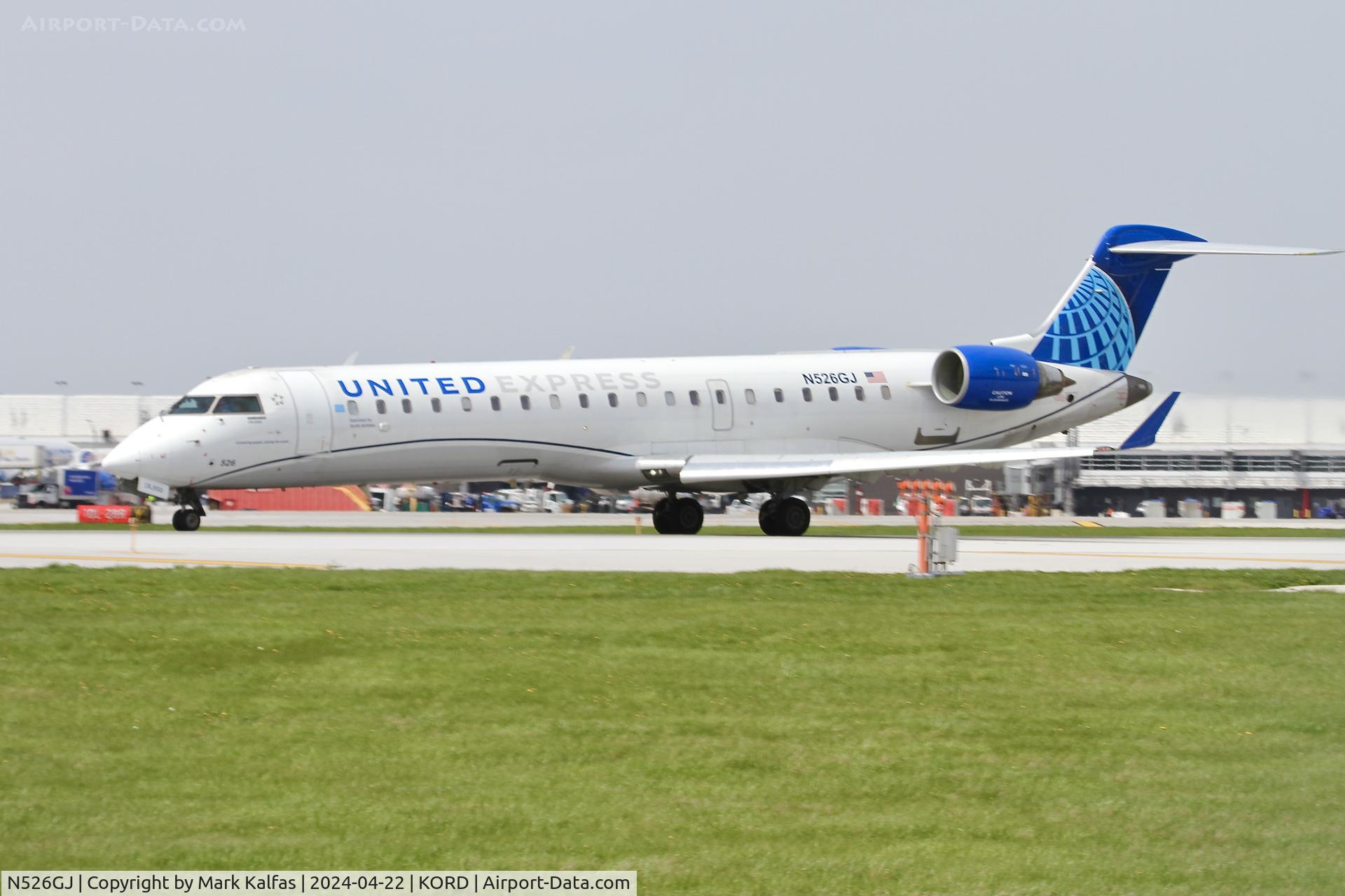 N526GJ, 2003 Bombardier CRJ-700 (CL-600-2C10) Regional Jet C/N 10129, CRJ7 GoJet/United Express Bombardier CRJ-701 (CRJ-550) CL-600-2C10 N526GJ departing 22L KORD